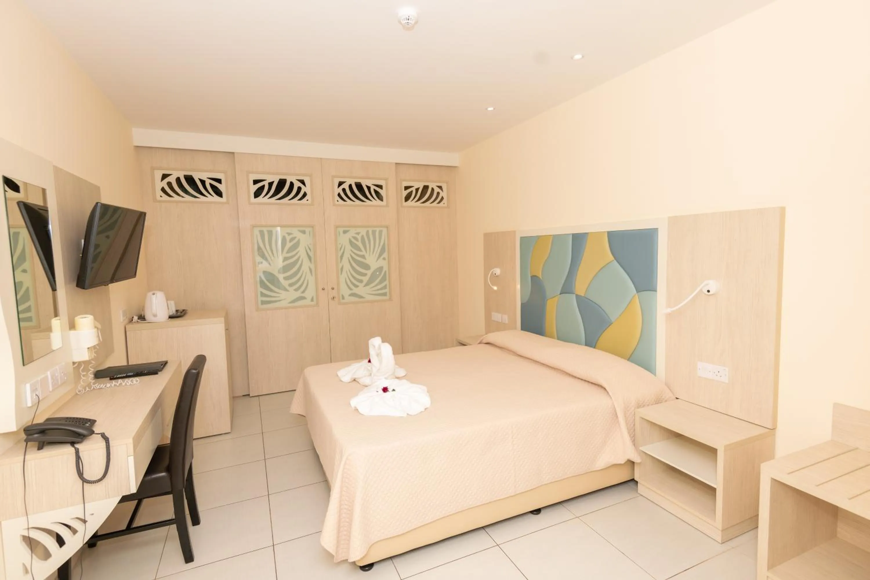 Bed in Tofinis Hotel