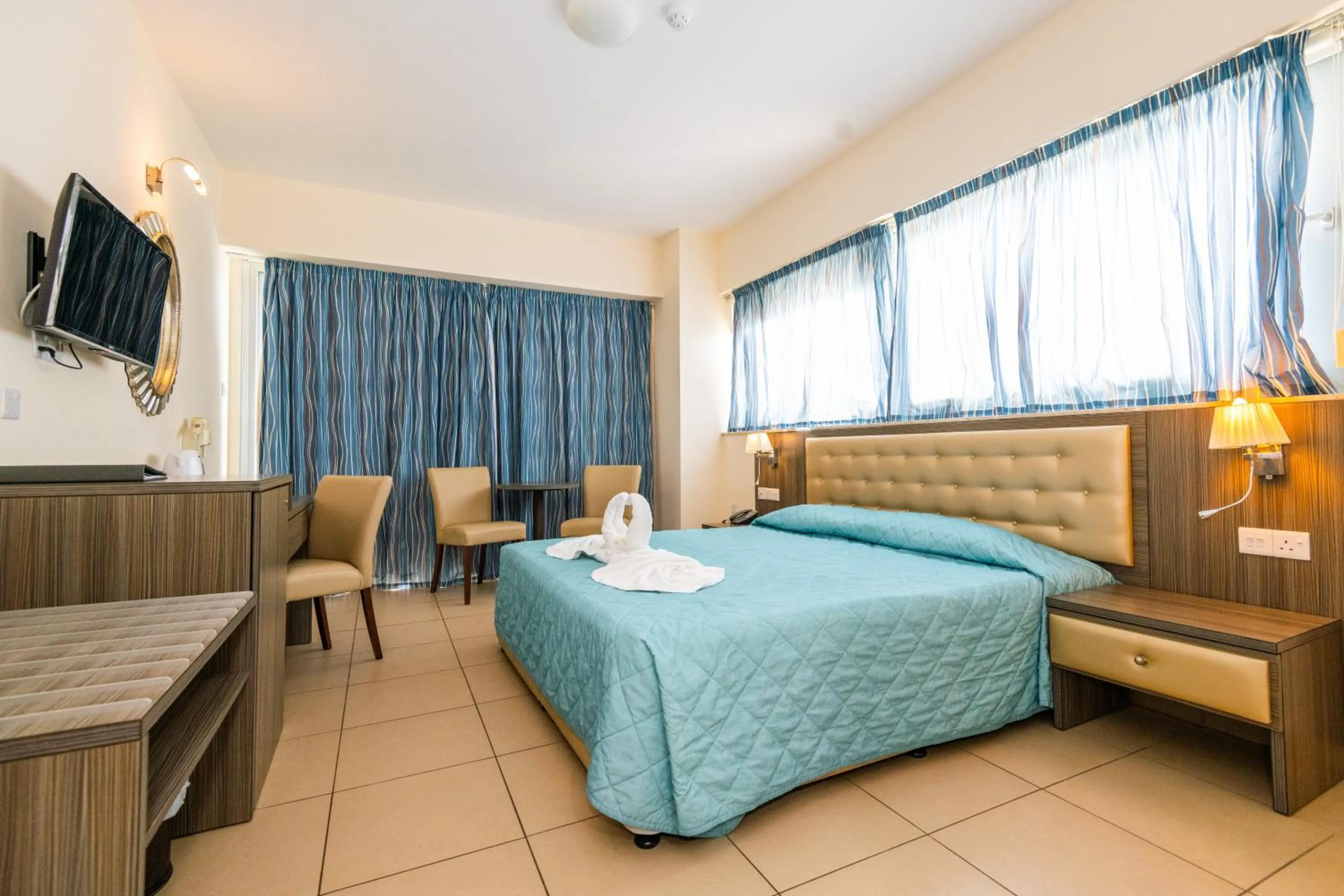 Bed in Tofinis Hotel