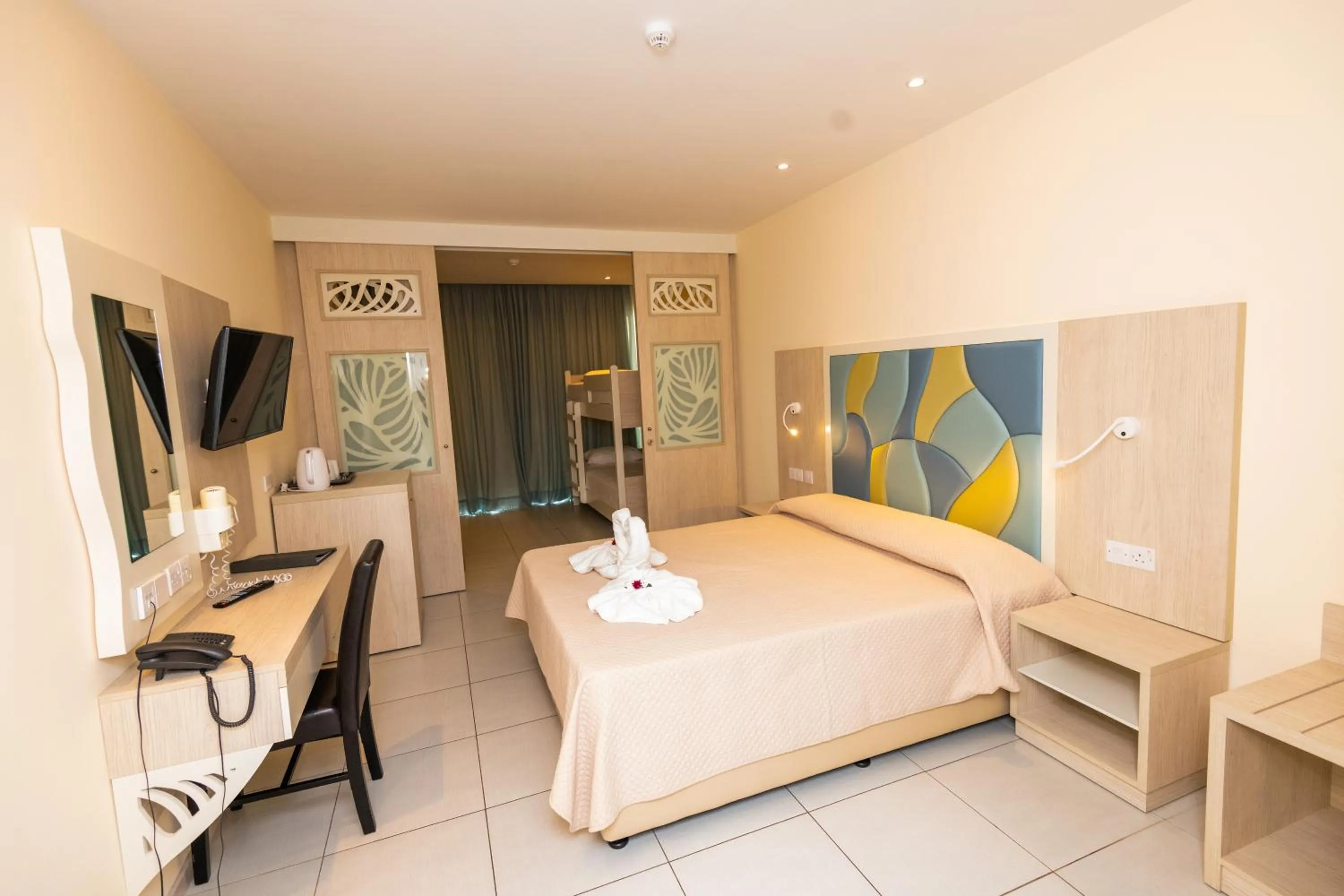 Bed in Tofinis Hotel