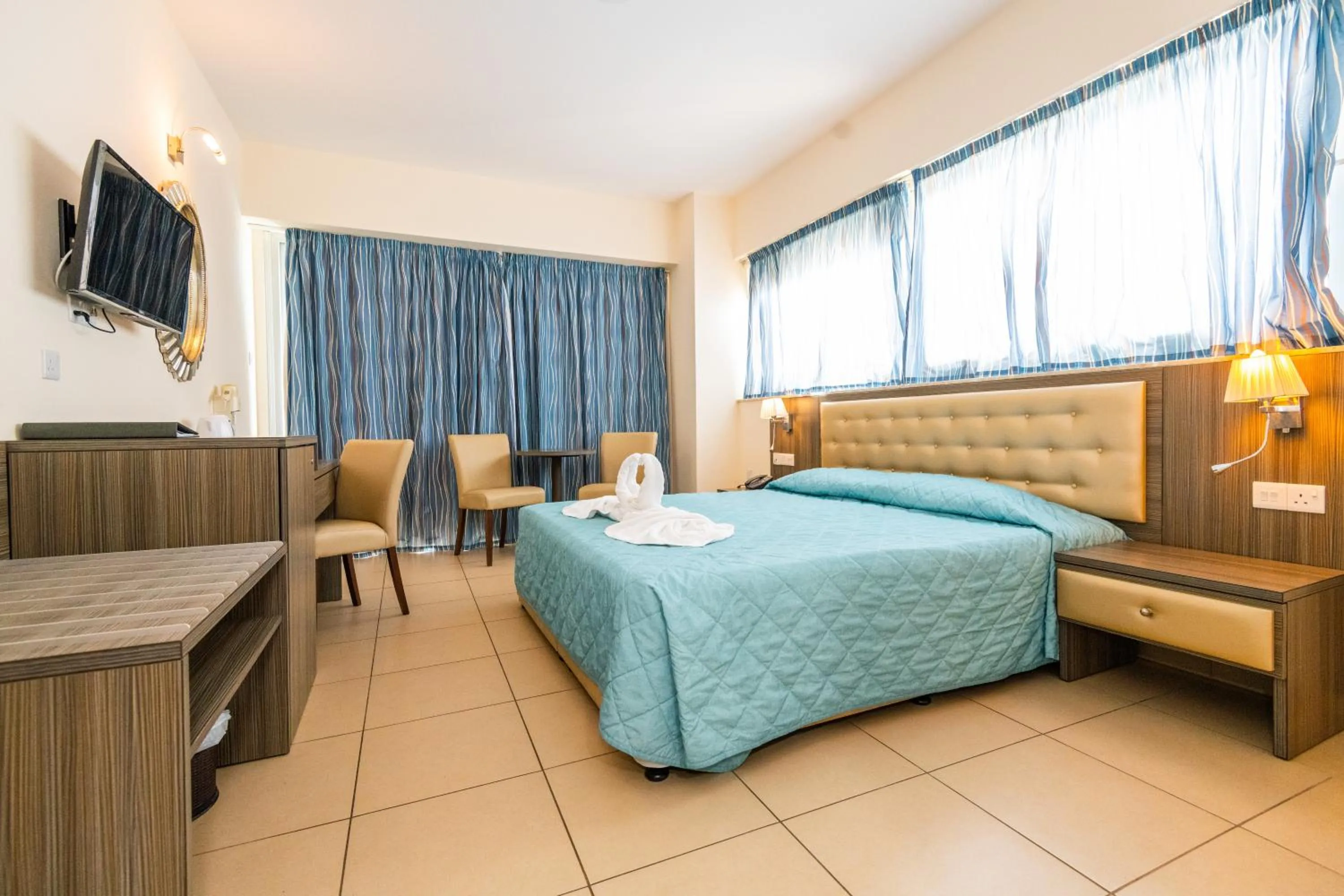 Bed in Tofinis Hotel