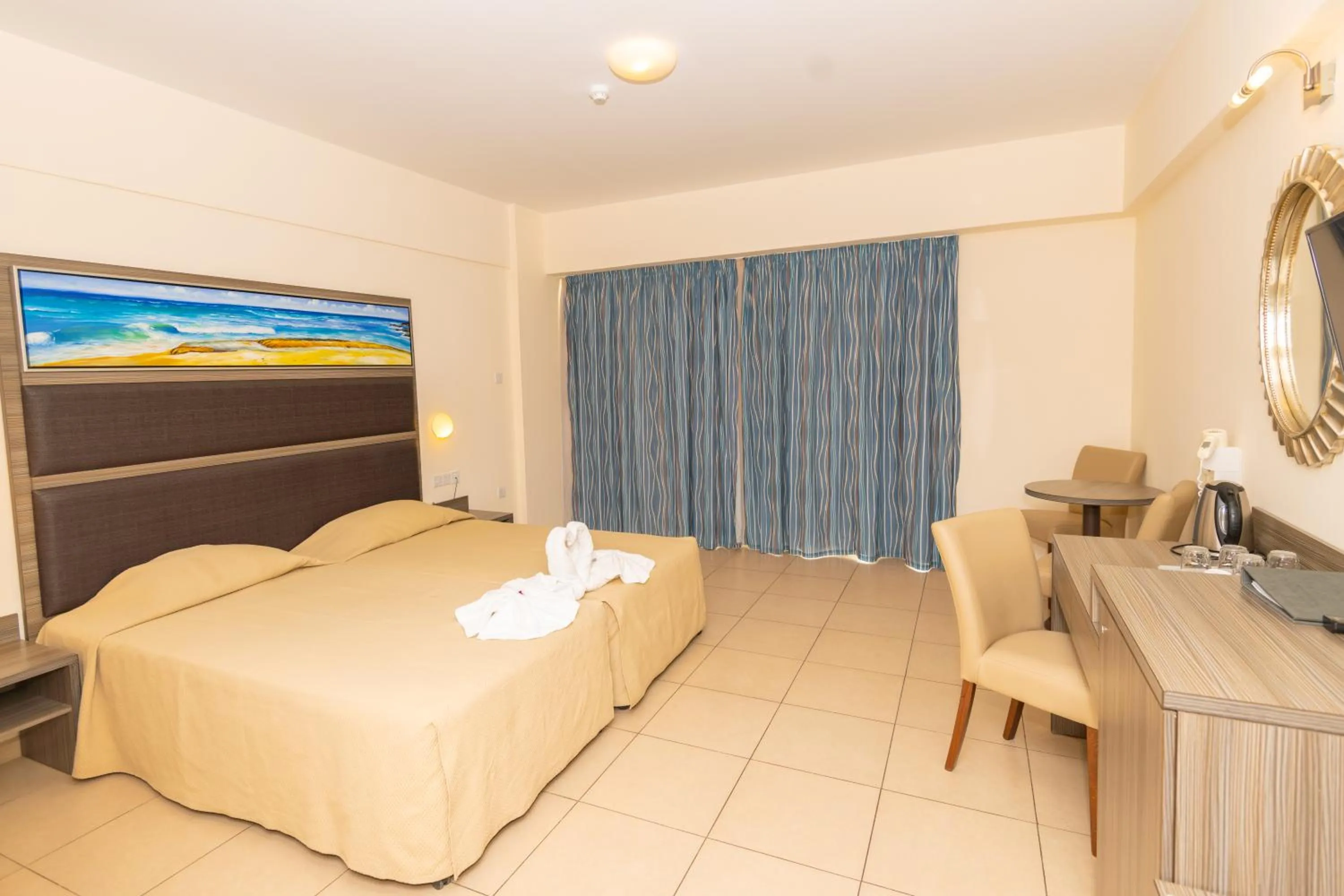 Bed in Tofinis Hotel