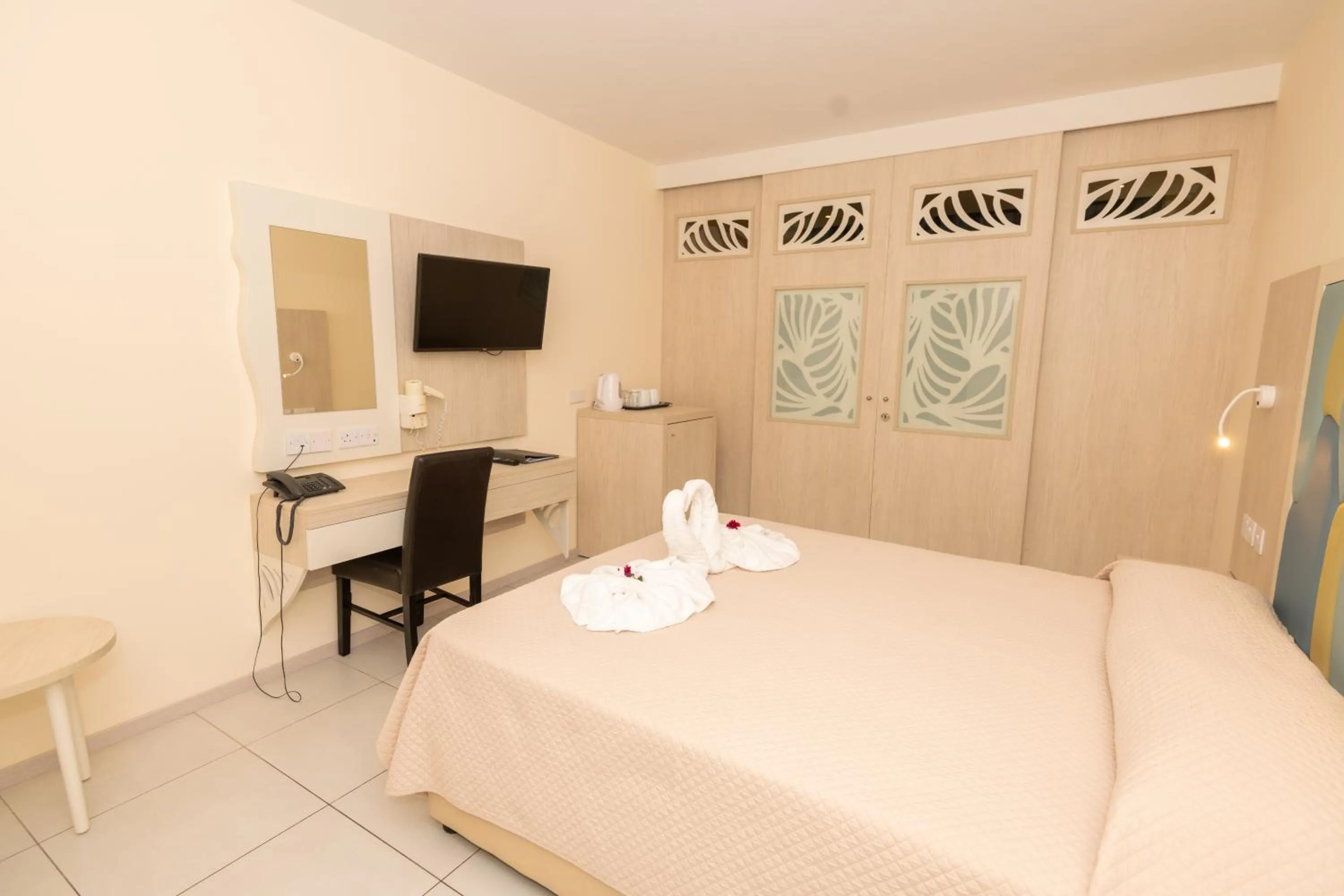 Bed in Tofinis Hotel