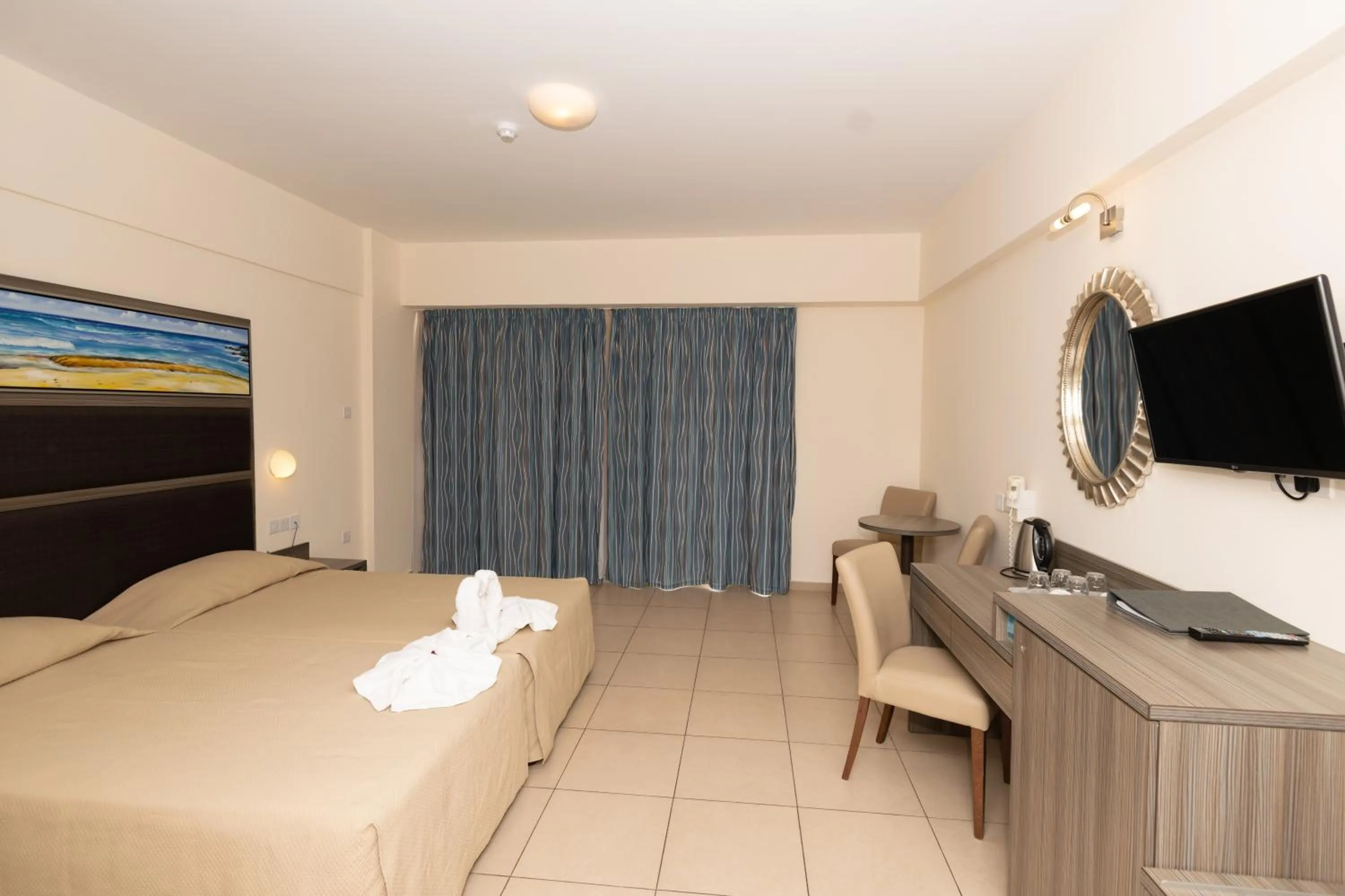 Bed in Tofinis Hotel