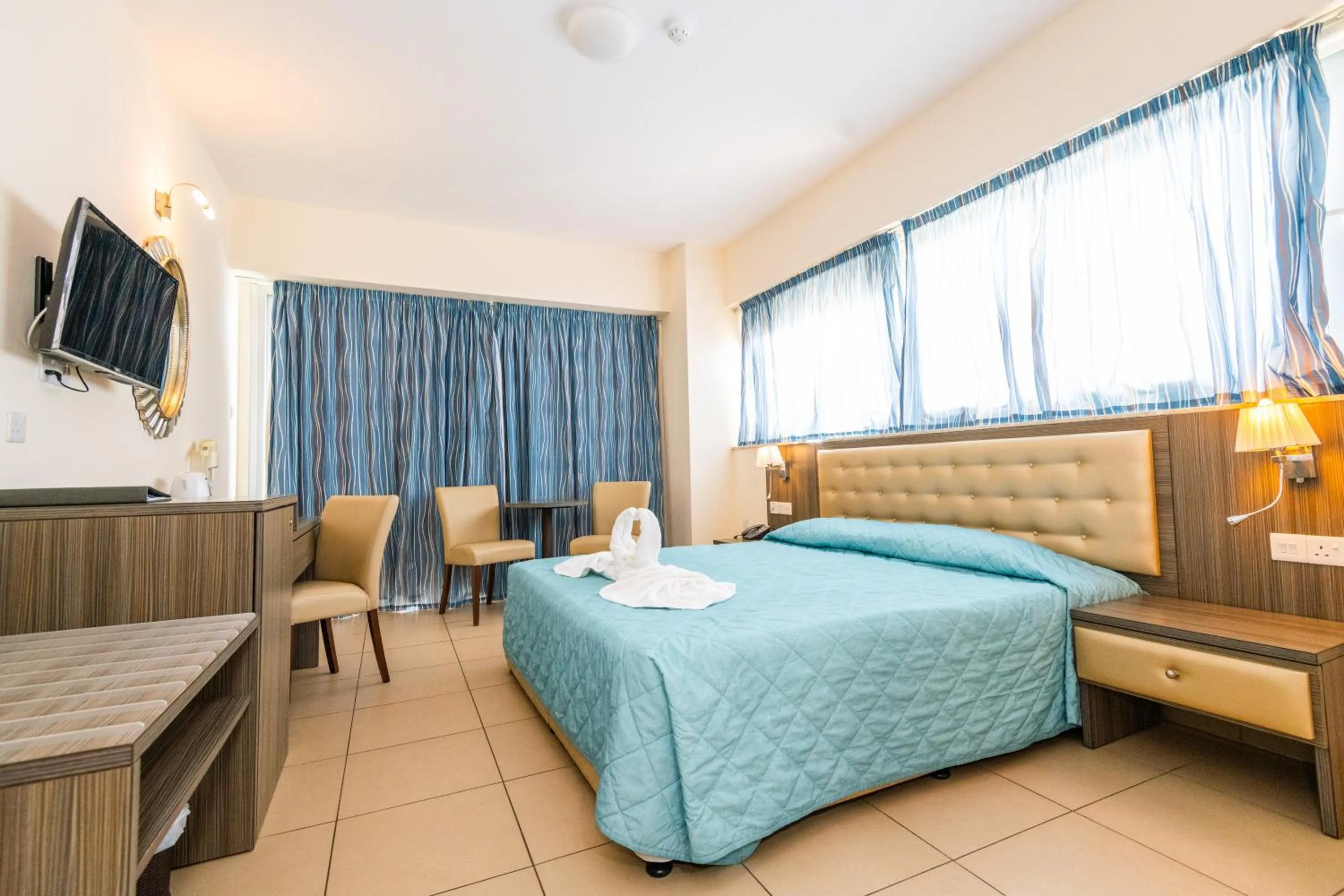 Bed in Tofinis Hotel