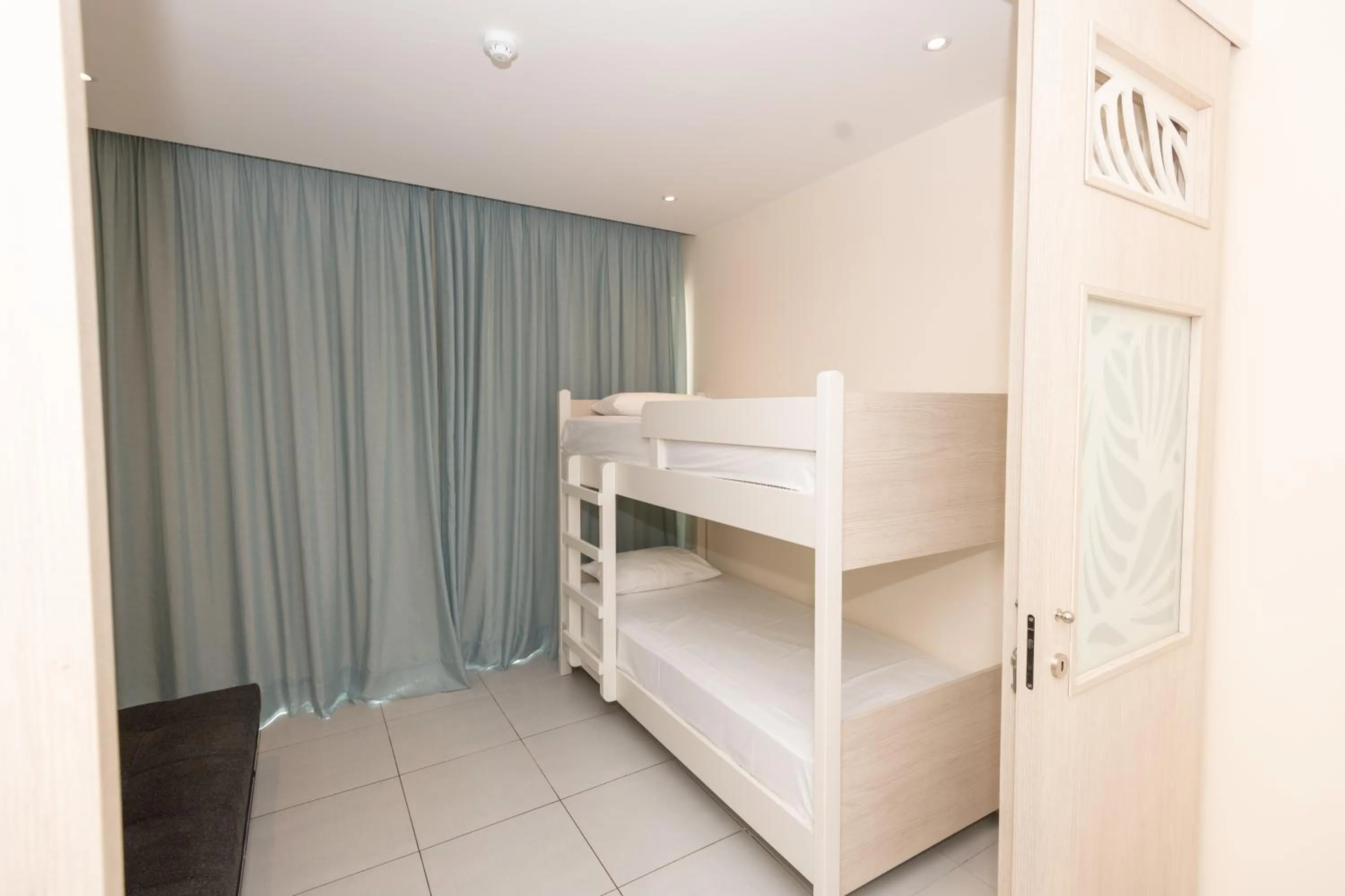 Bed in Tofinis Hotel