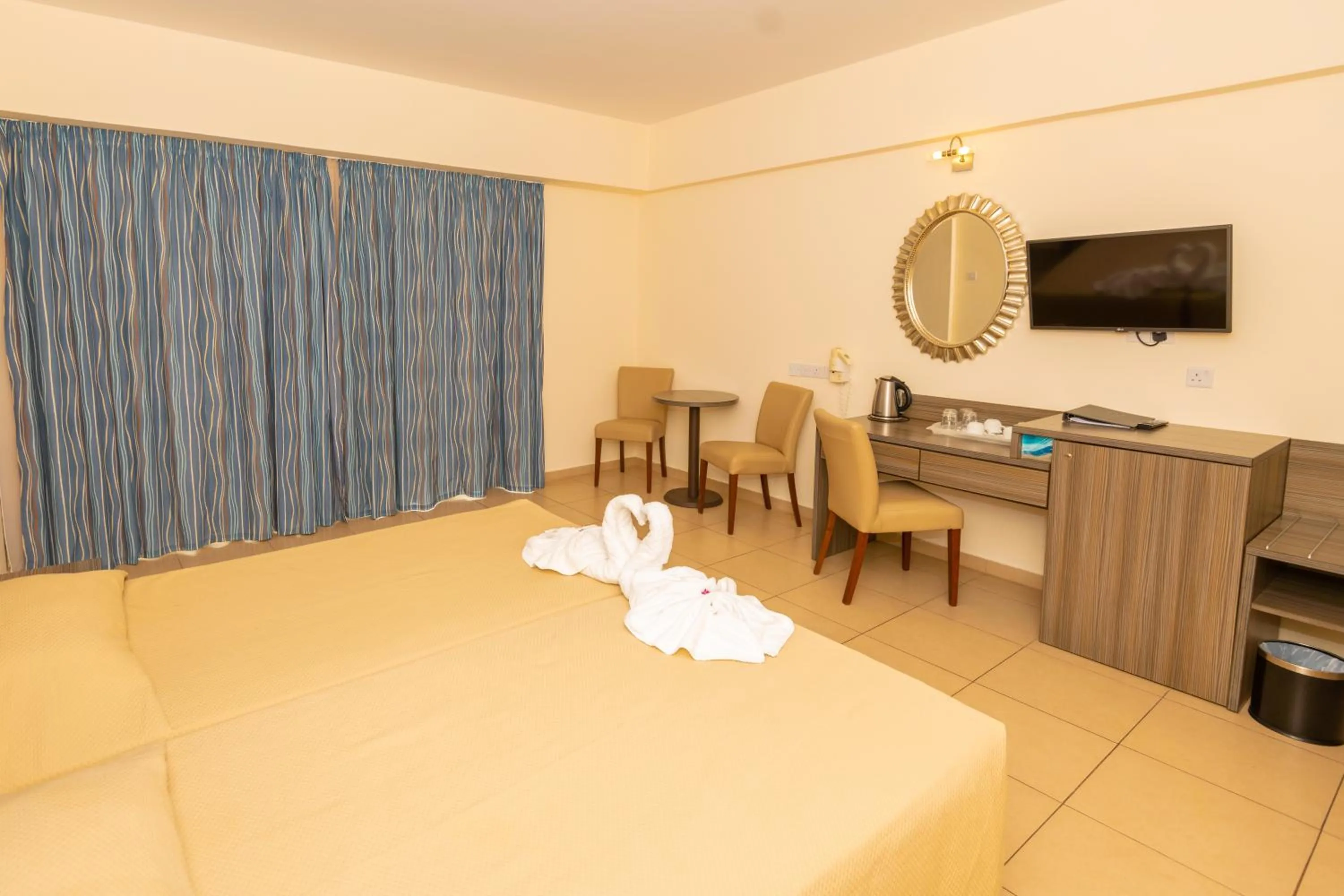 Bed in Tofinis Hotel