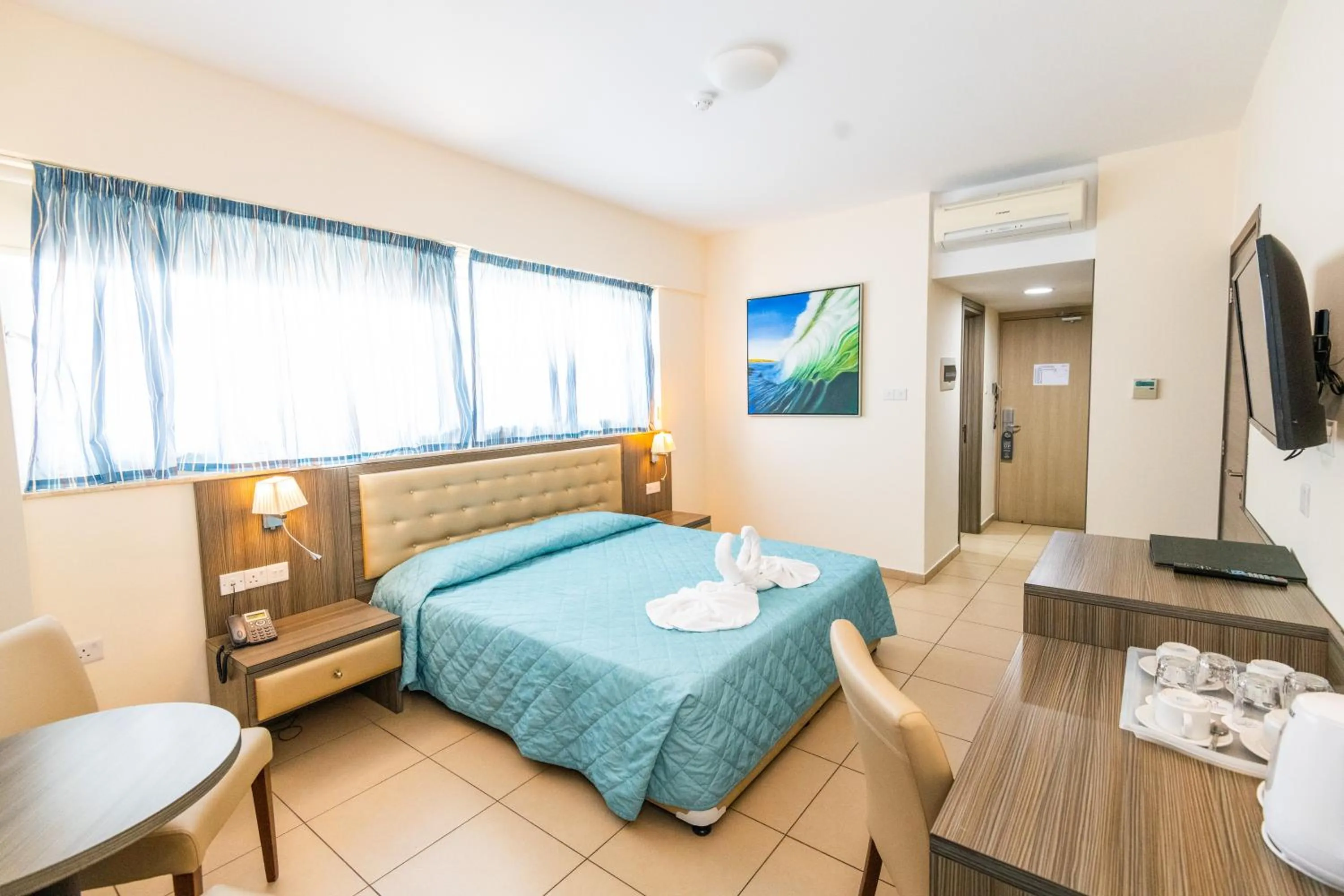 Bed in Tofinis Hotel