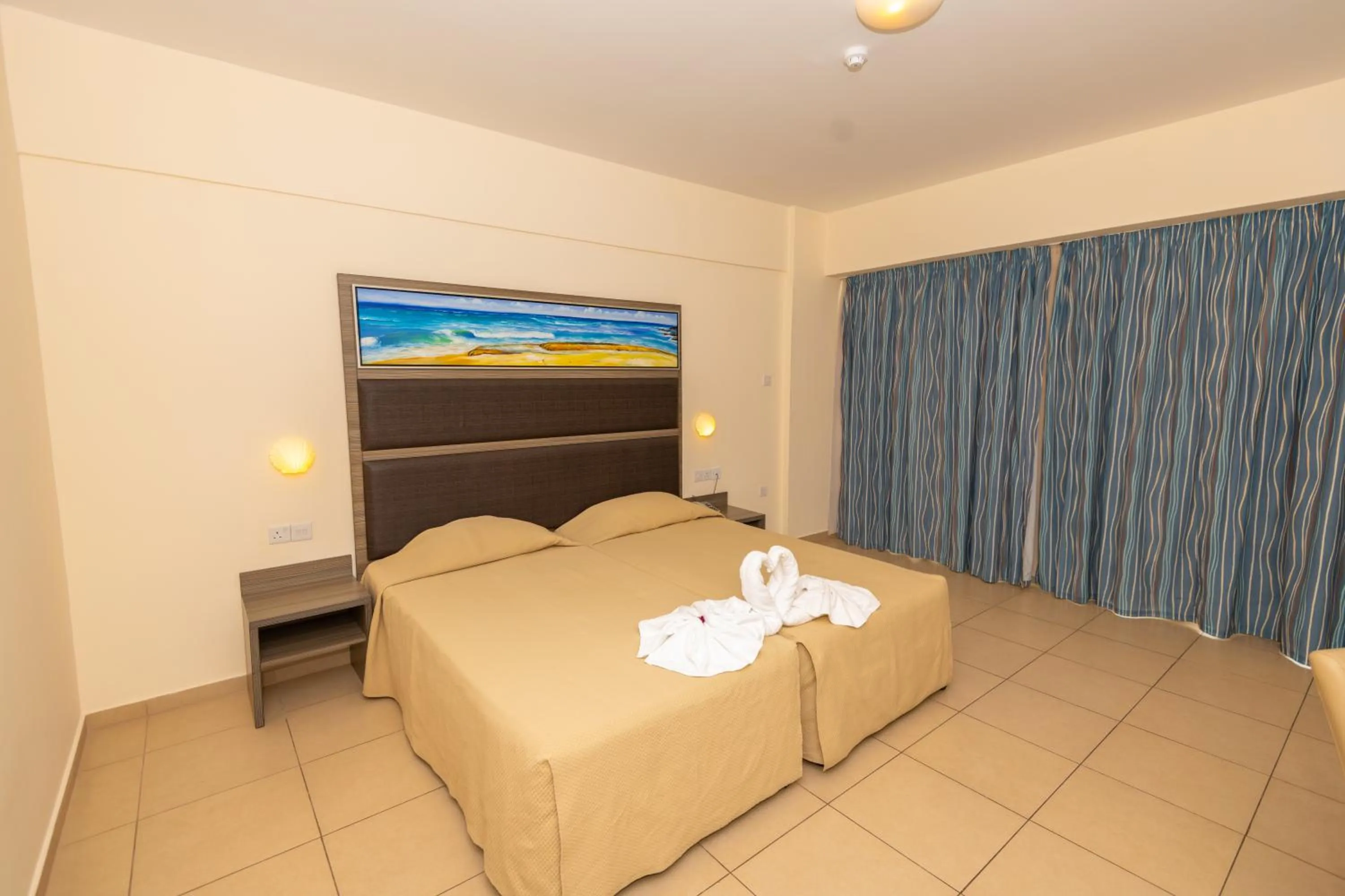 Bed in Tofinis Hotel