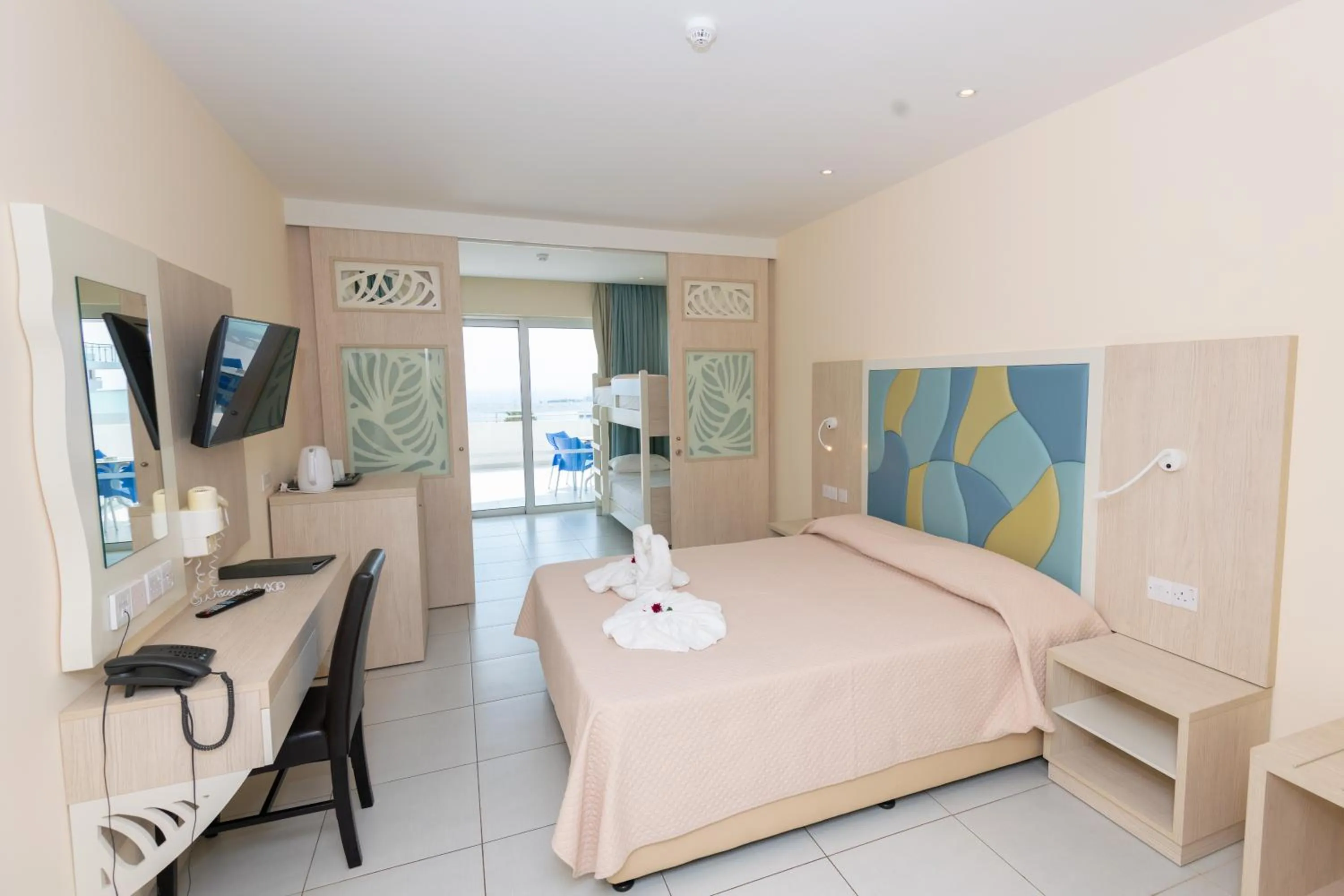 Bed in Tofinis Hotel