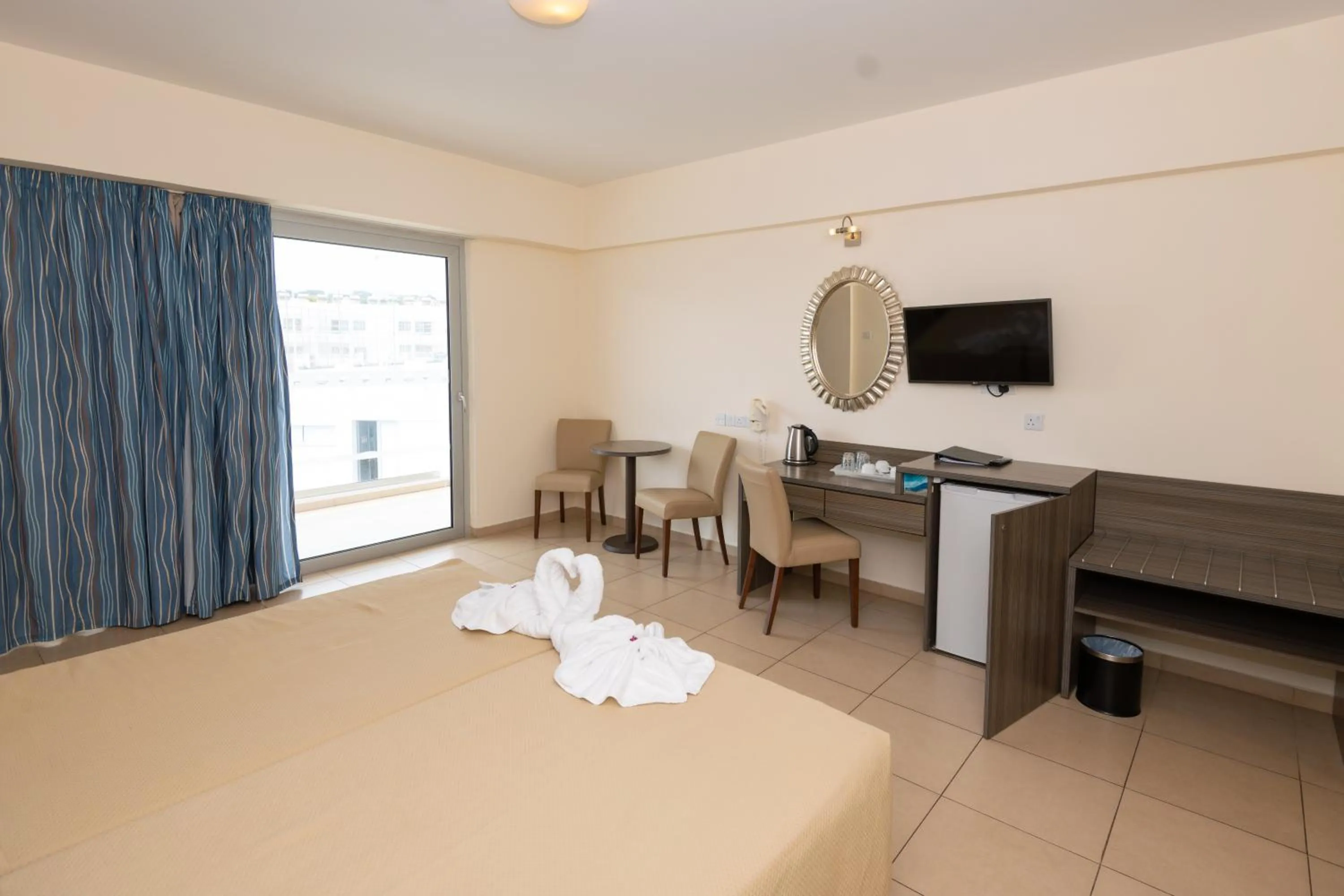 Bed in Tofinis Hotel