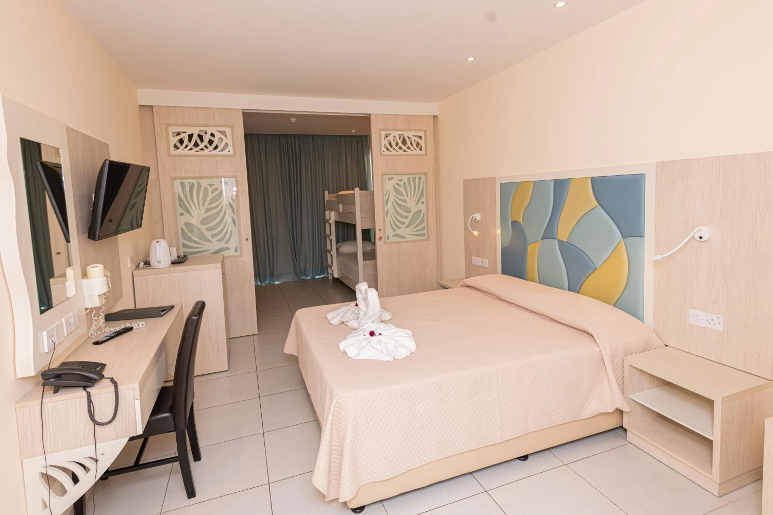 Bed in Tofinis Hotel