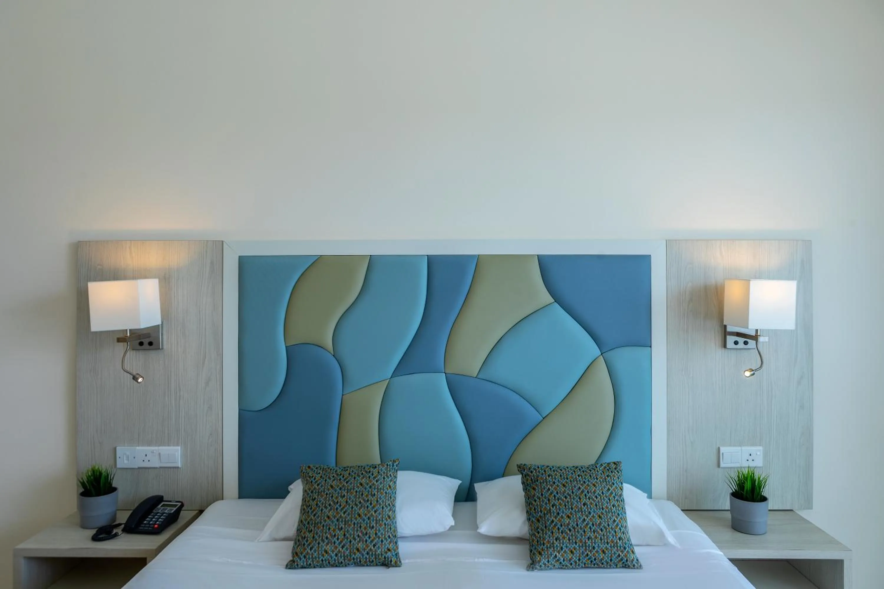 Bed in Tofinis Hotel