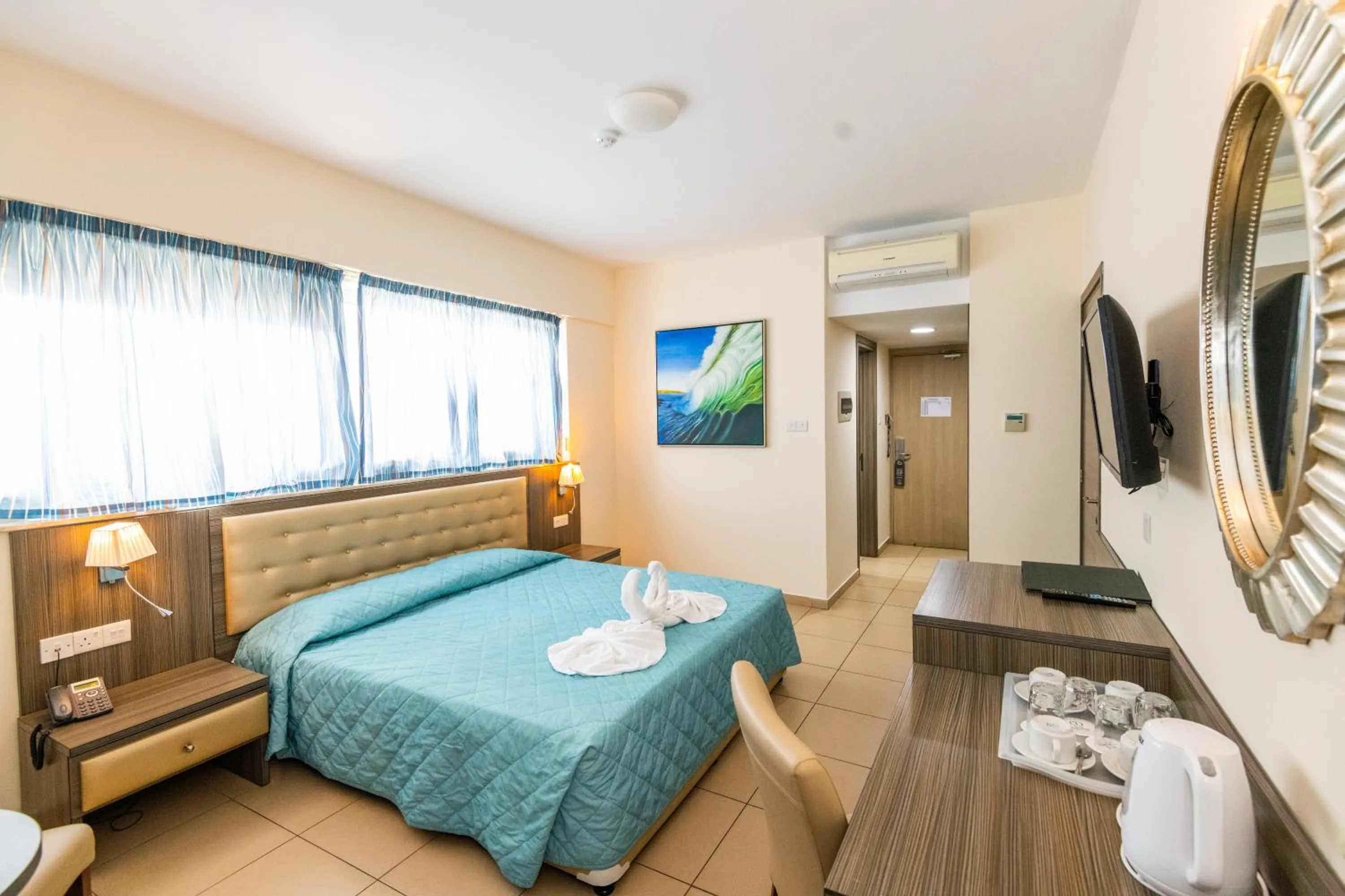 Bed in Tofinis Hotel