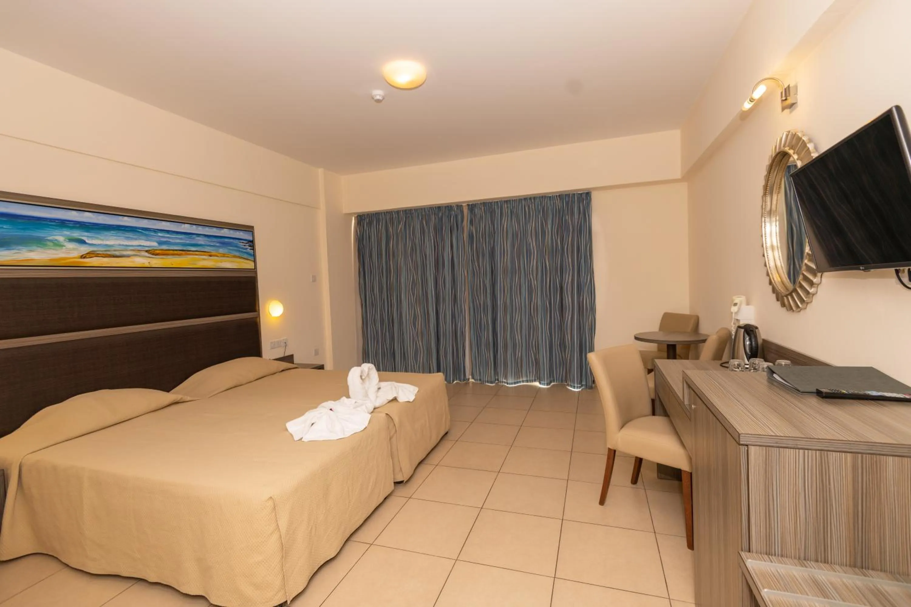 Bed in Tofinis Hotel