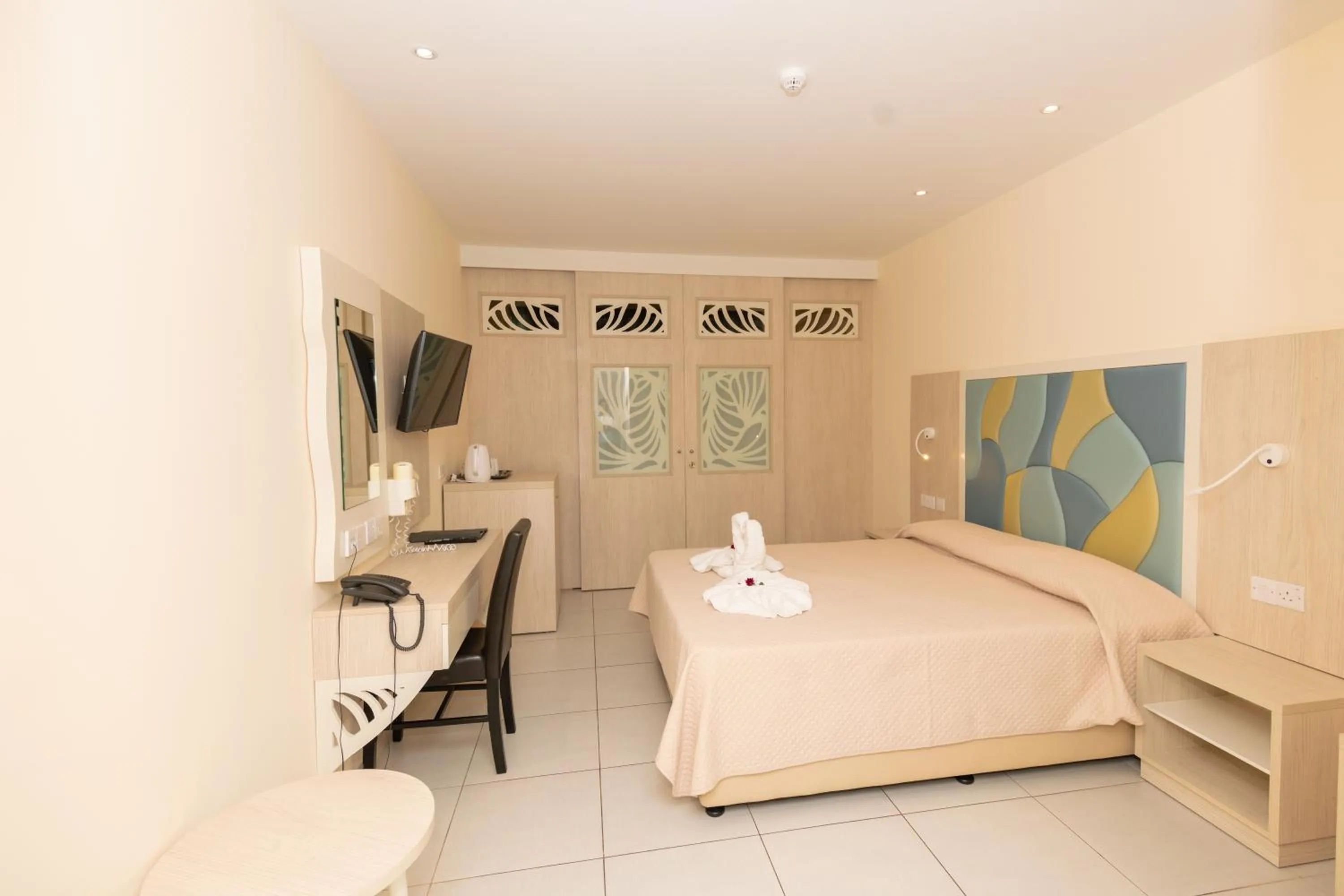 Bed in Tofinis Hotel