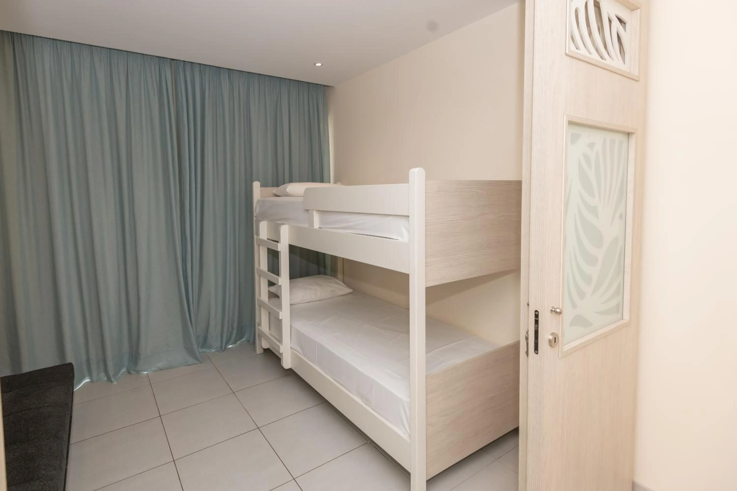 Bed in Tofinis Hotel