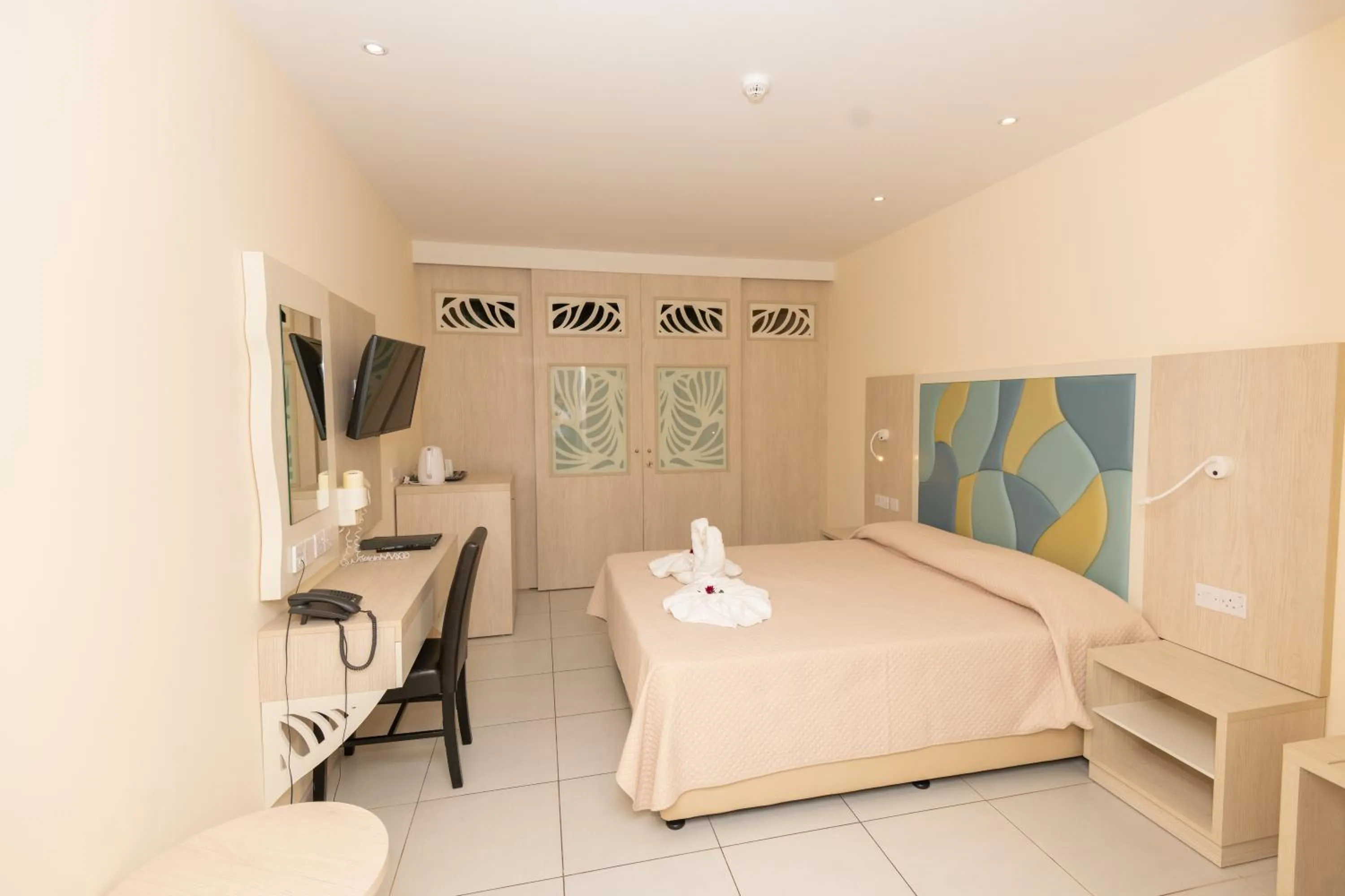 Bed in Tofinis Hotel