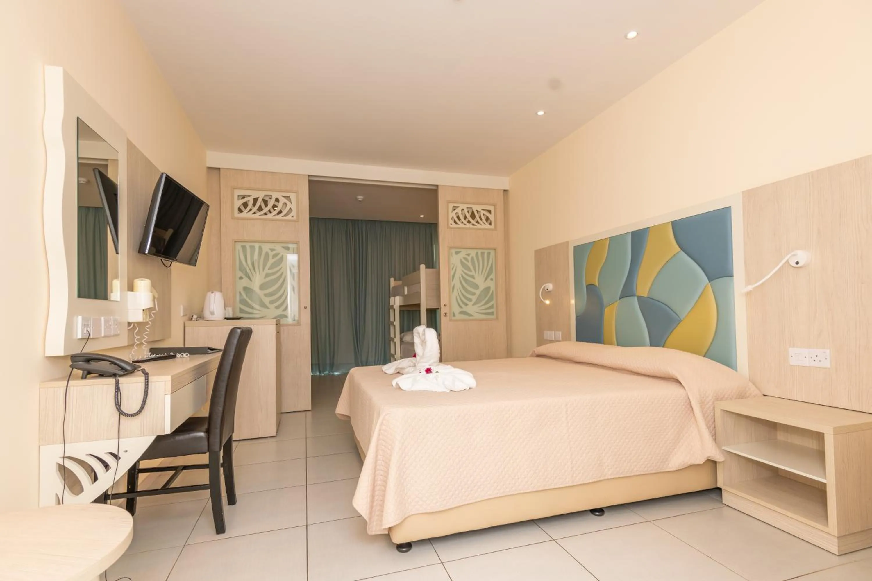 Bed in Tofinis Hotel