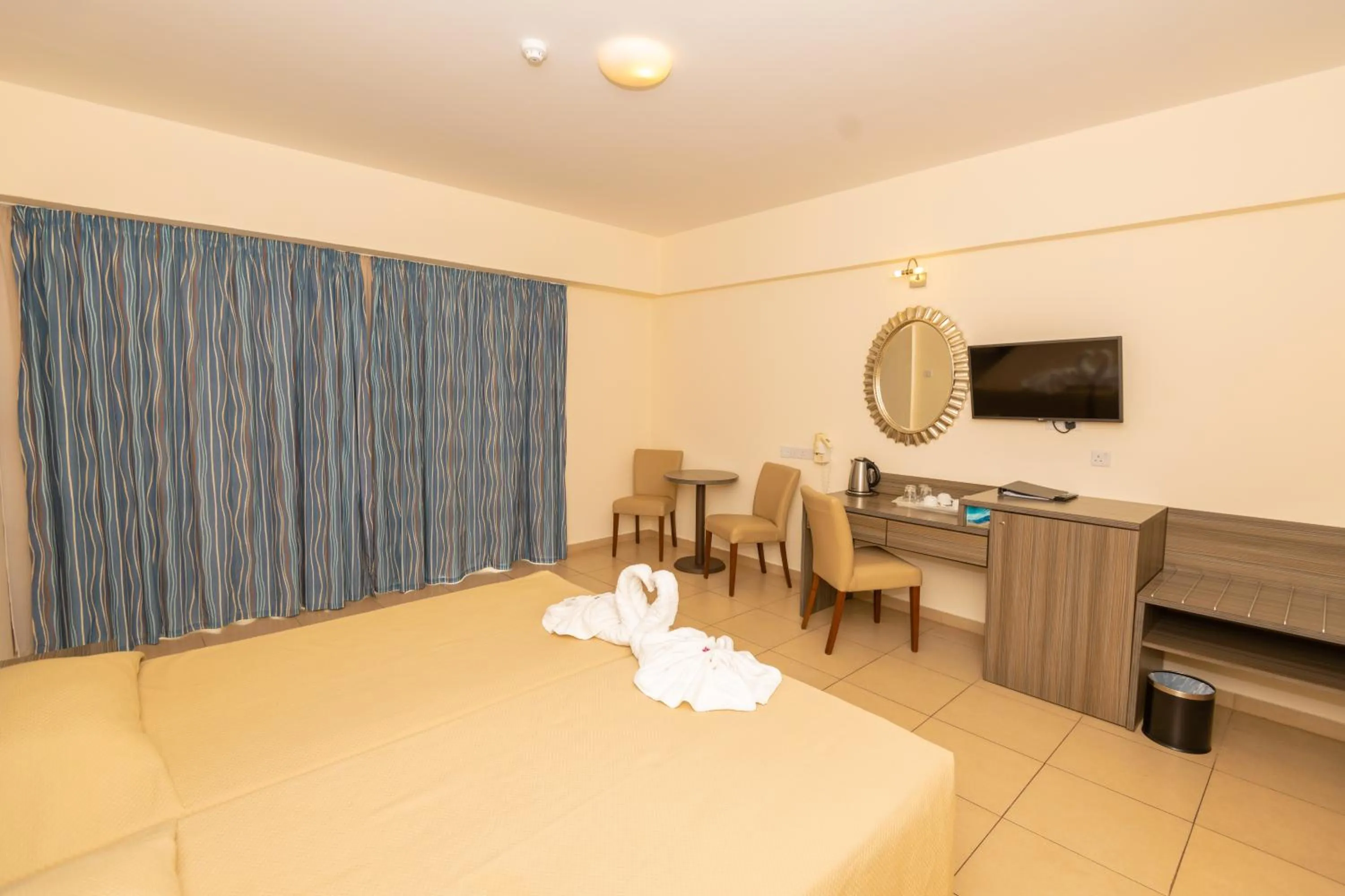 Bed in Tofinis Hotel