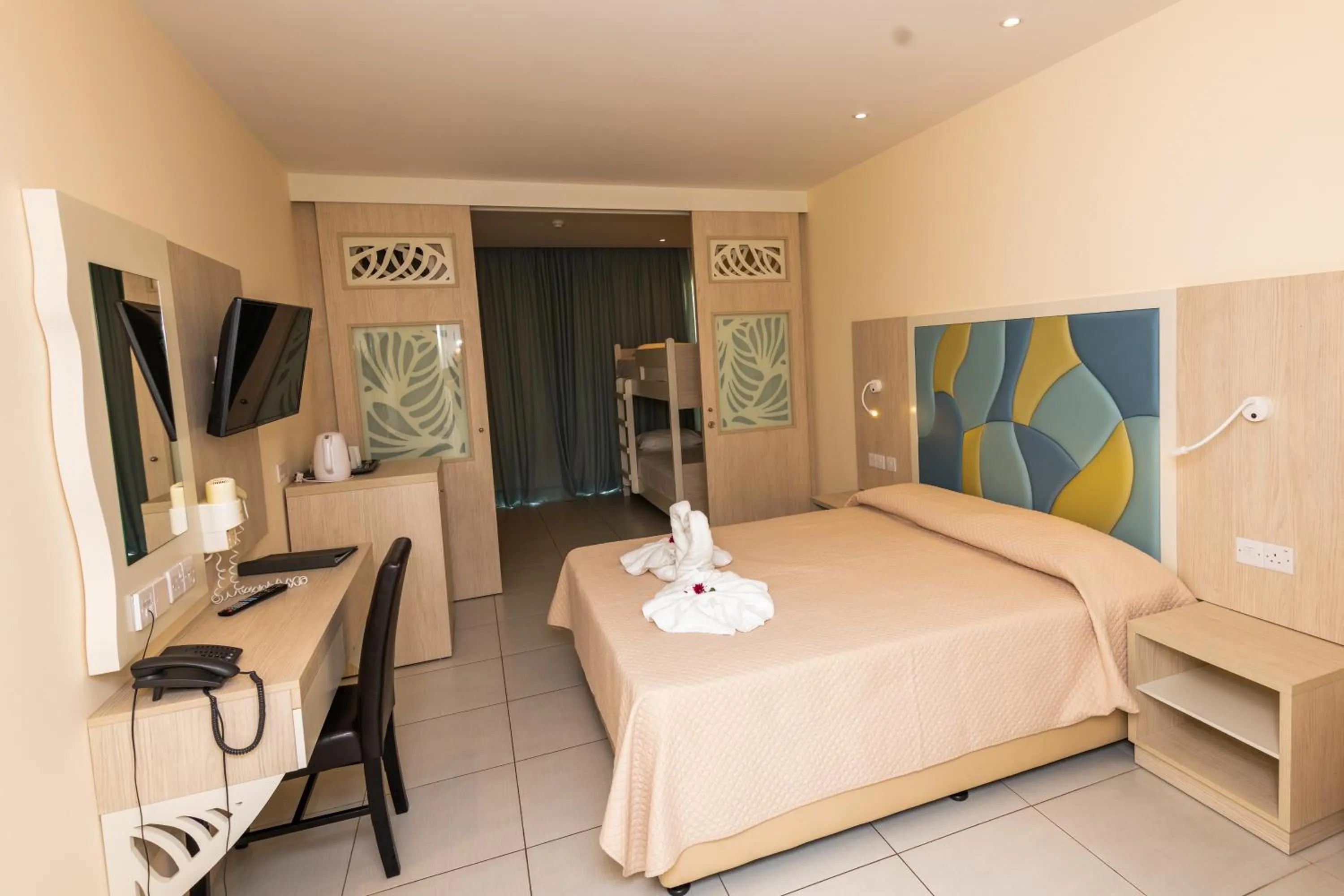 Bed in Tofinis Hotel