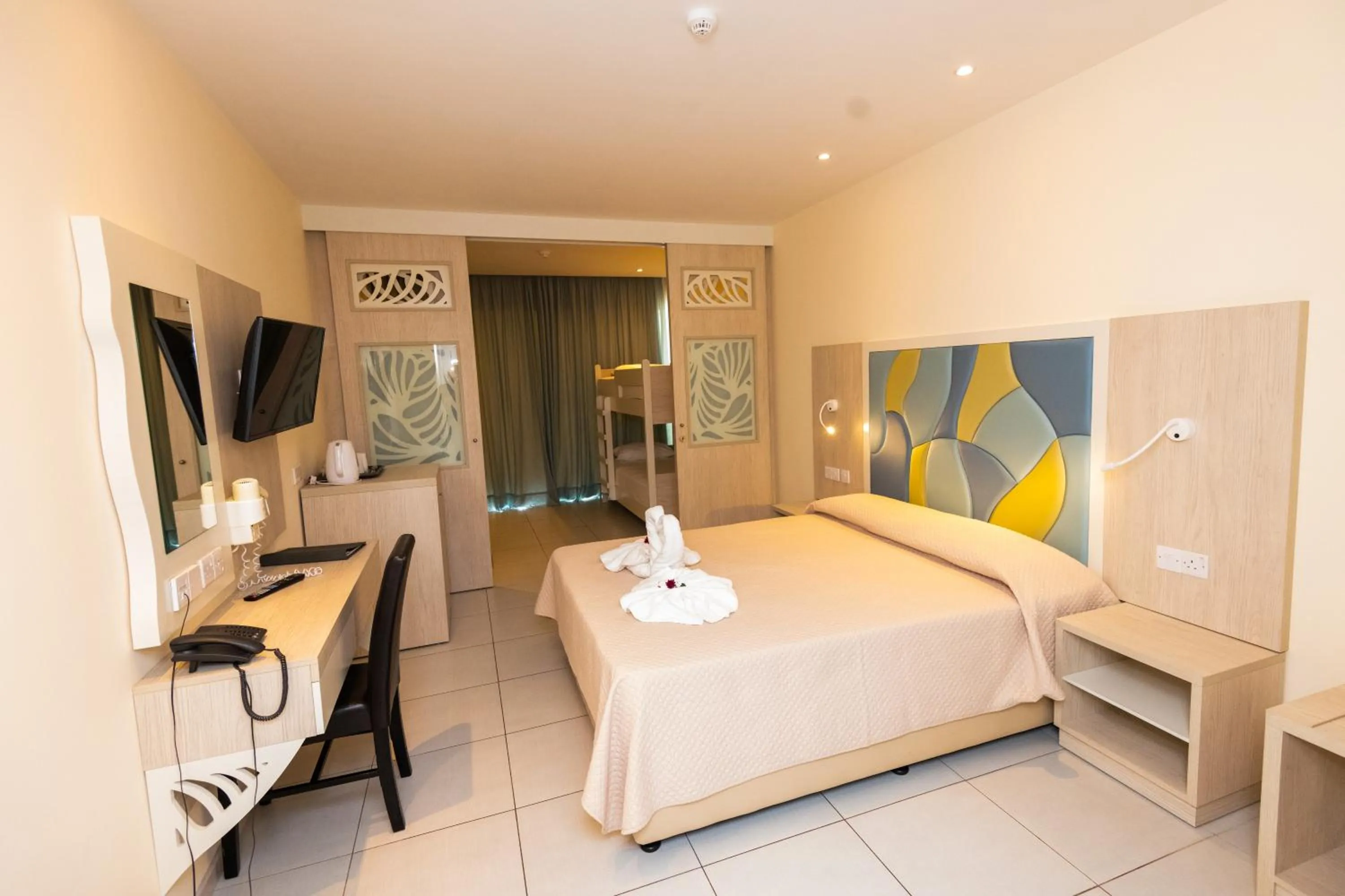 Bed in Tofinis Hotel