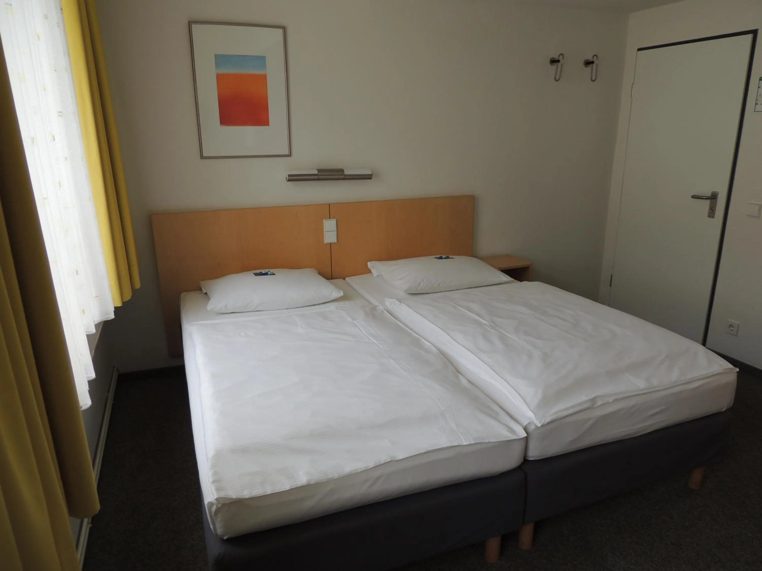 Bed in CVJM Düsseldorf Hotel & Tagung