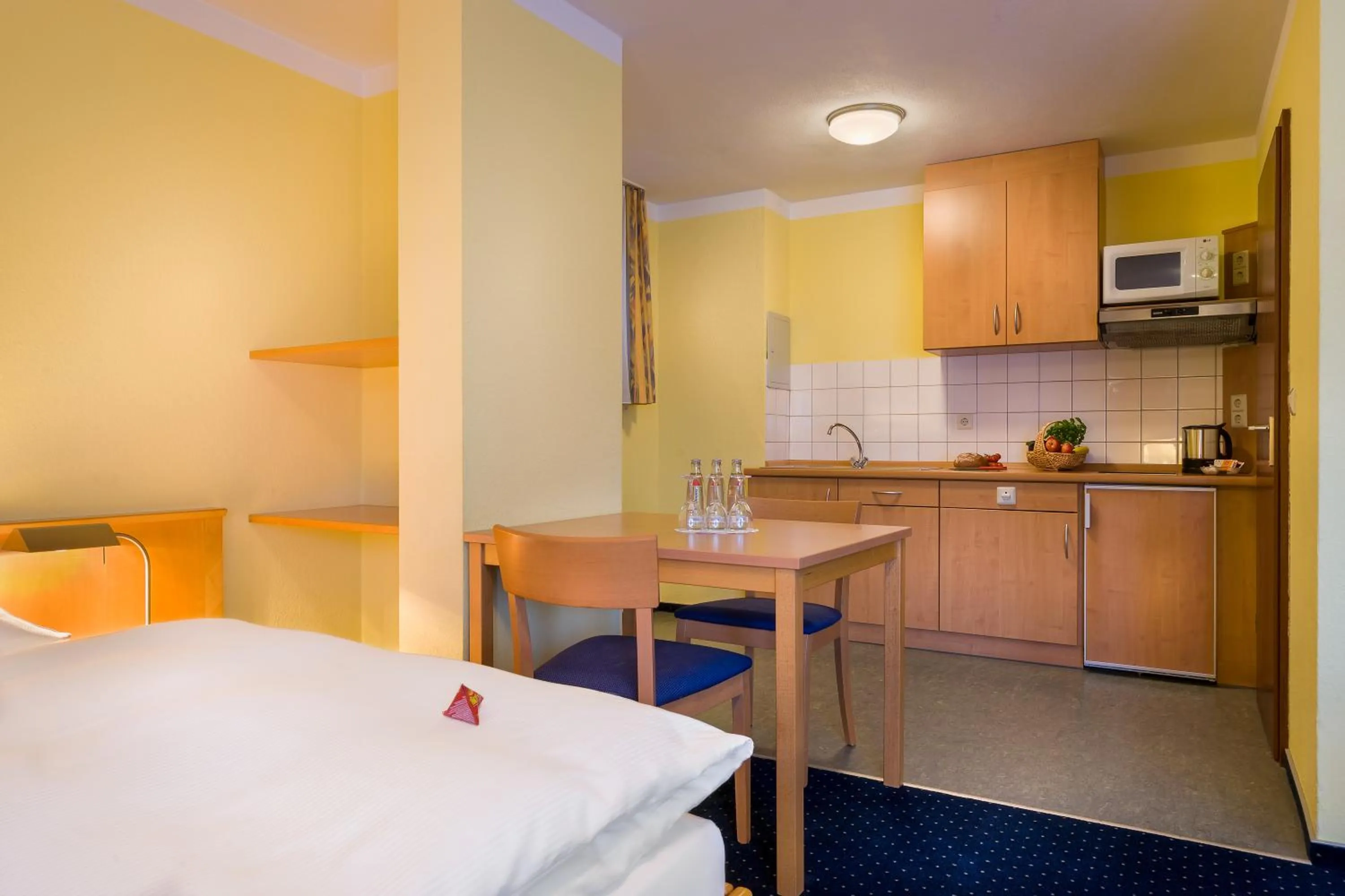 Kitchen or kitchenette in acora Karlsruhe Zentrum Living the City