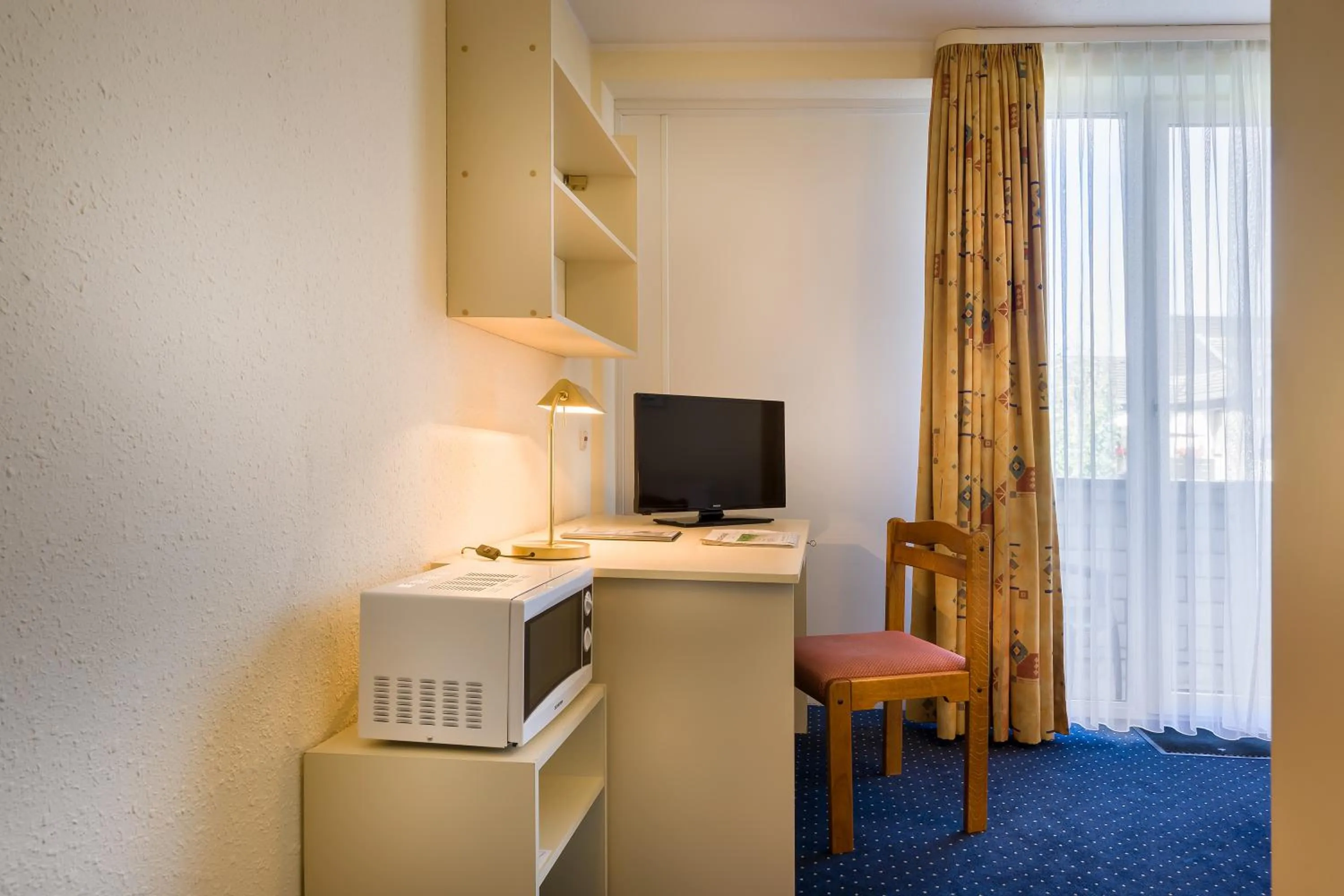 Photo of the whole room in acora Bonn Living the City