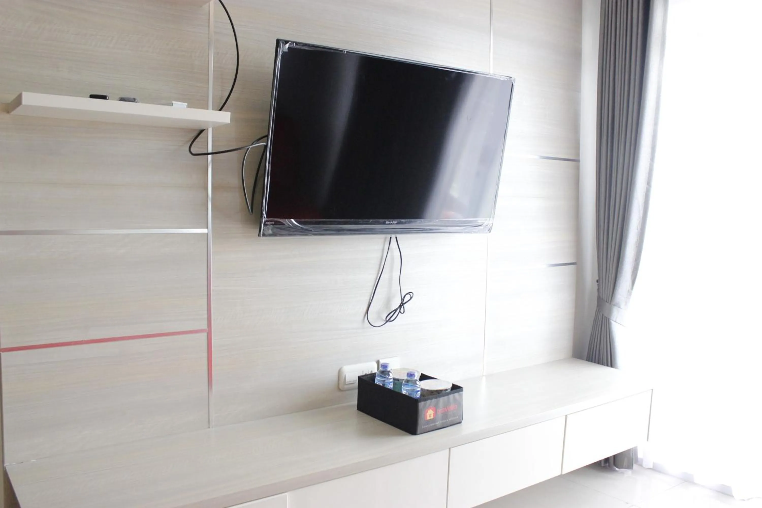 Bright and Stylish 2BR at Gateway Pasteur Apartment By Travelio