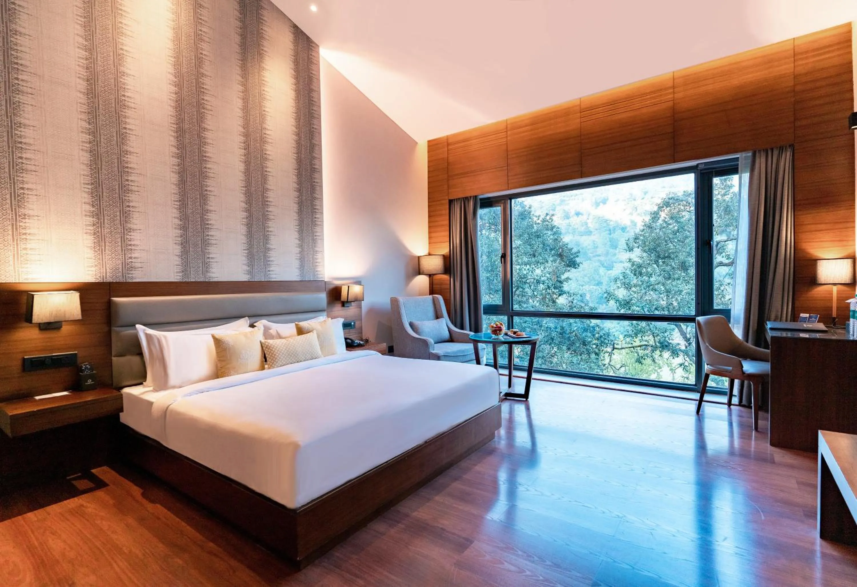 Bed in The Rosefinch Sarovar Portico