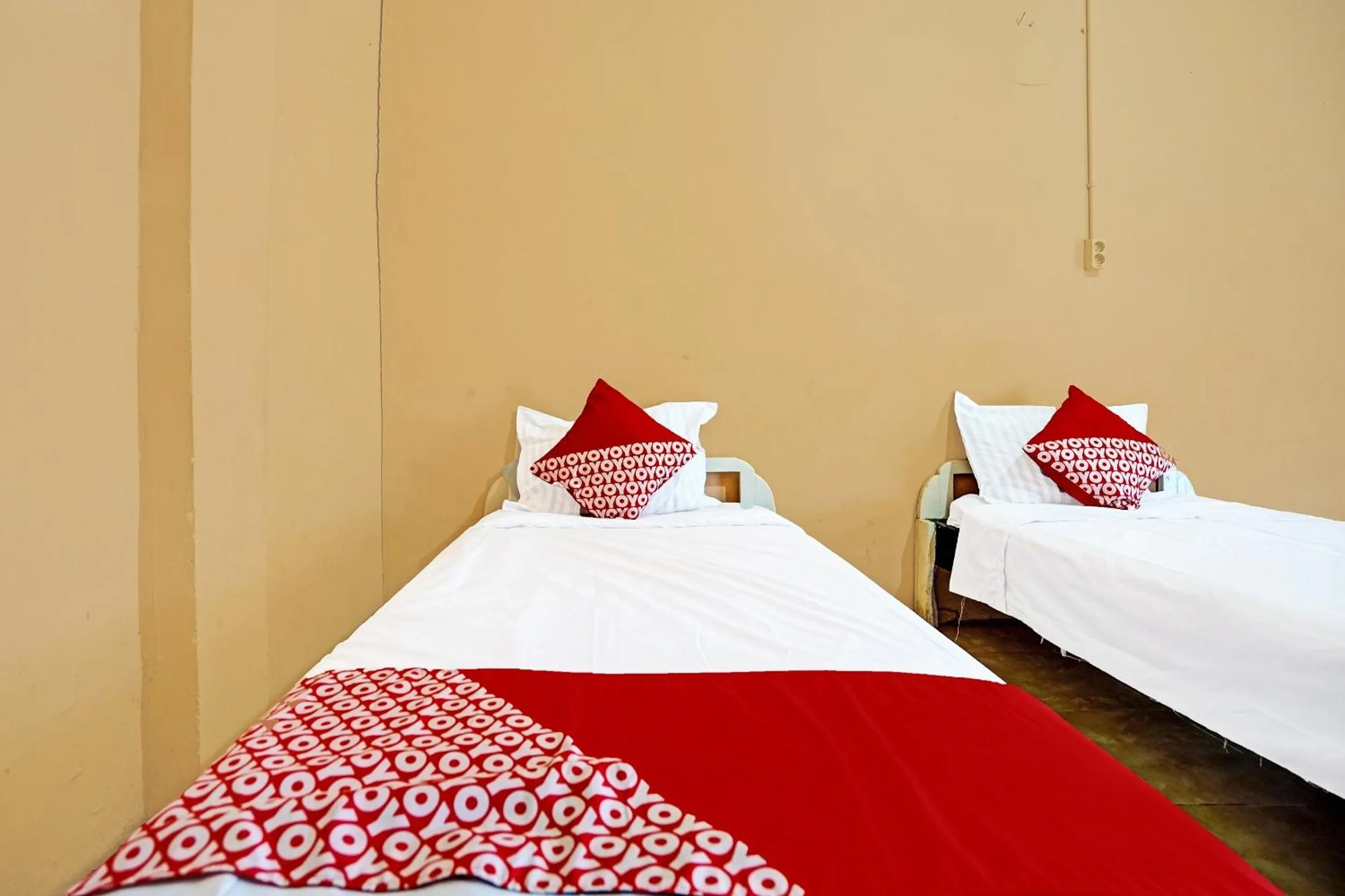 Bedroom, Bed in OYO 3205 Penginapan Mikial Ismi Kayuagung Syariah