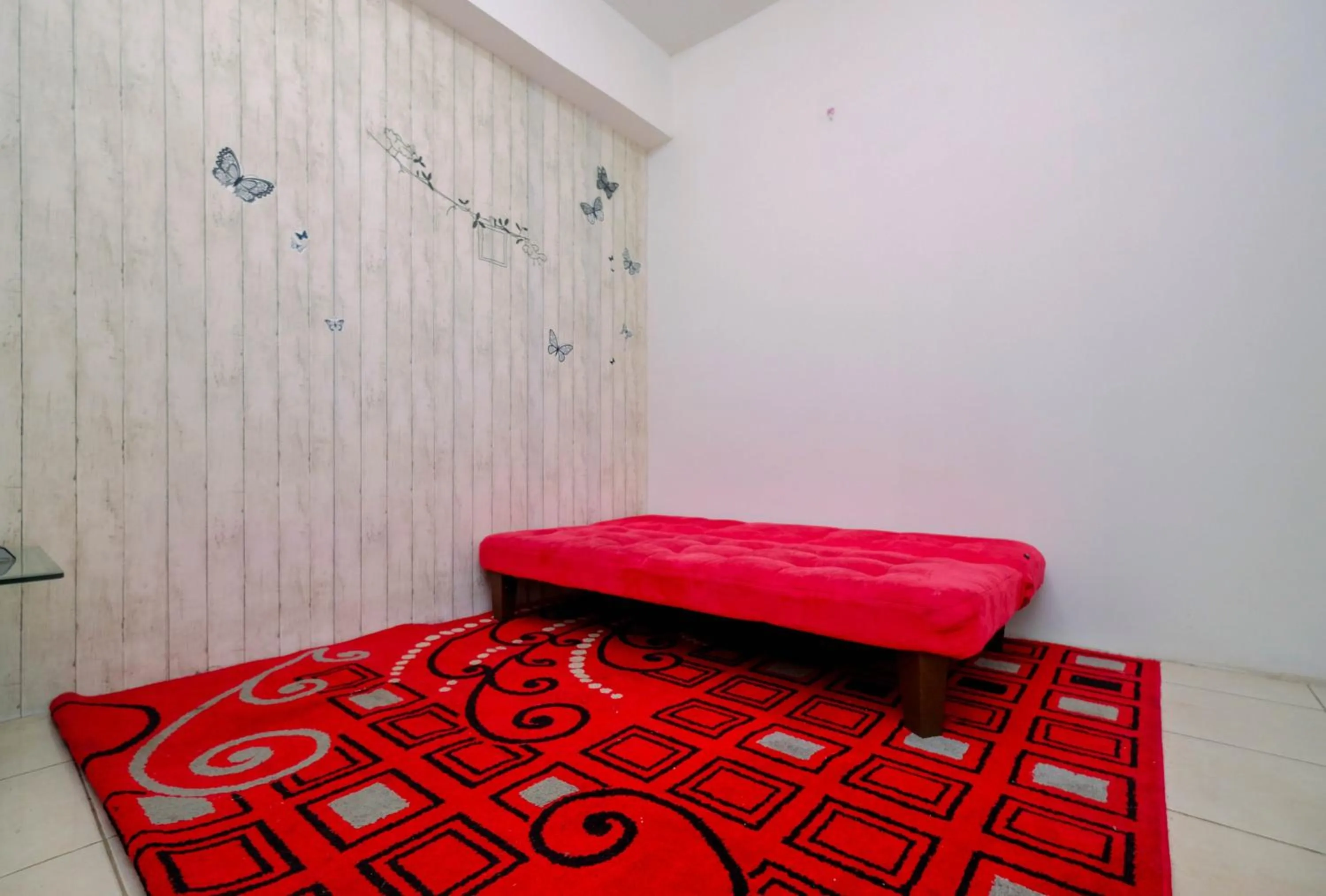 Living room, Bed in Best Price 1BR Apartment at Teluk Intan By Travelio