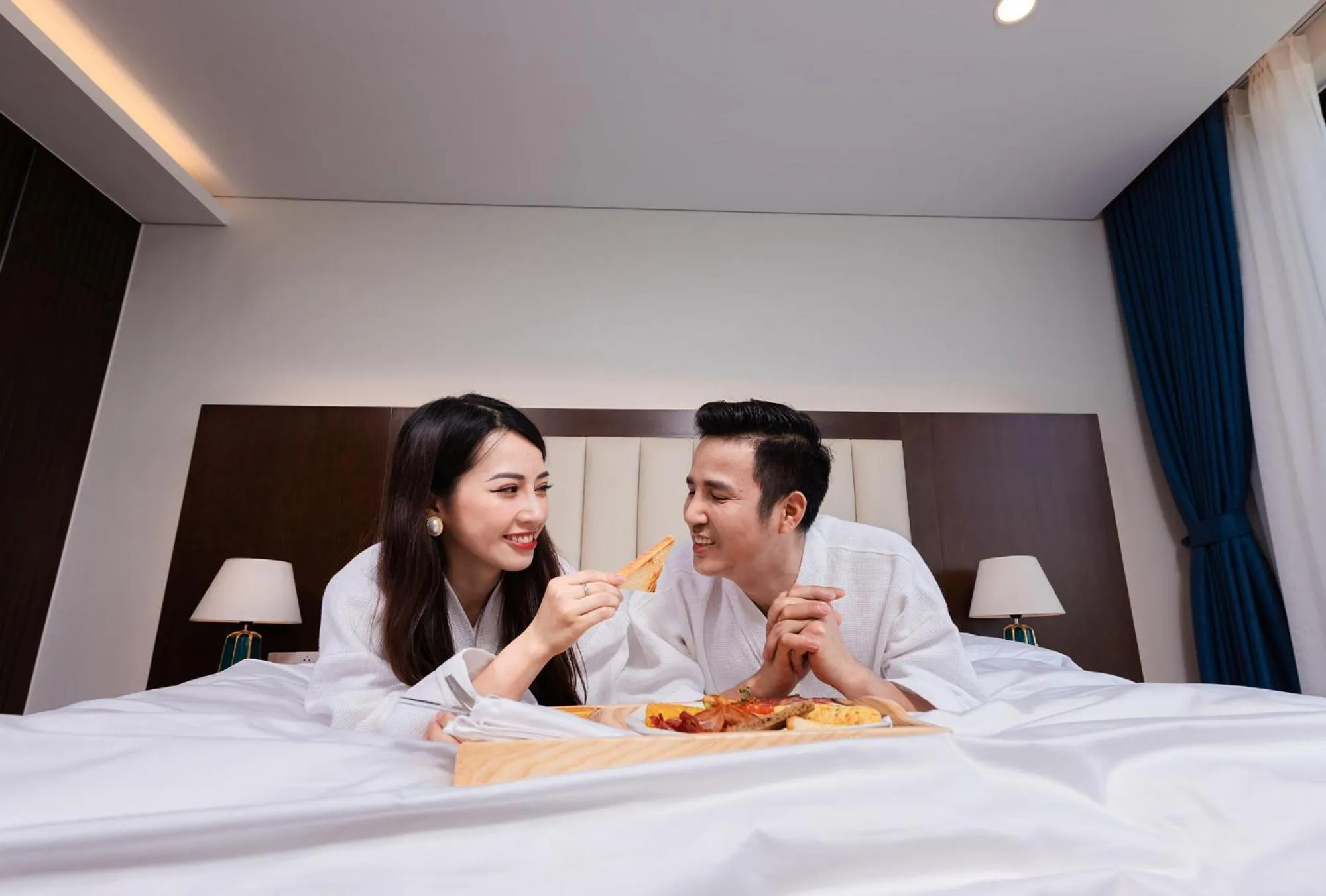 Bed in Wyndham Sky Lake Resort and Villas