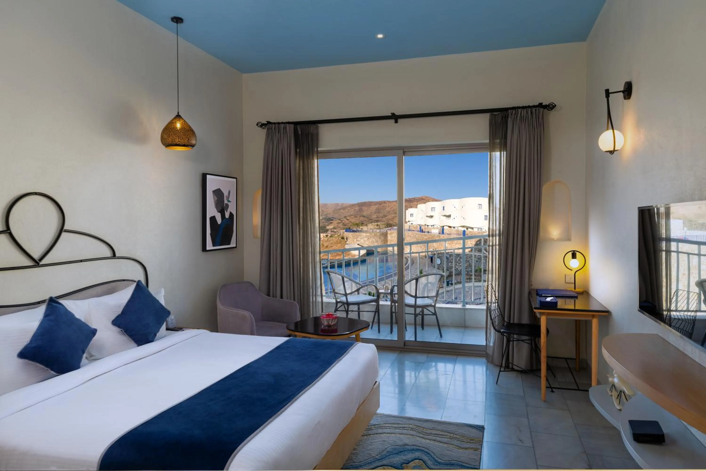 Photo of the whole room, Bed in Ramee Royal Resort & Spa - Udaipur