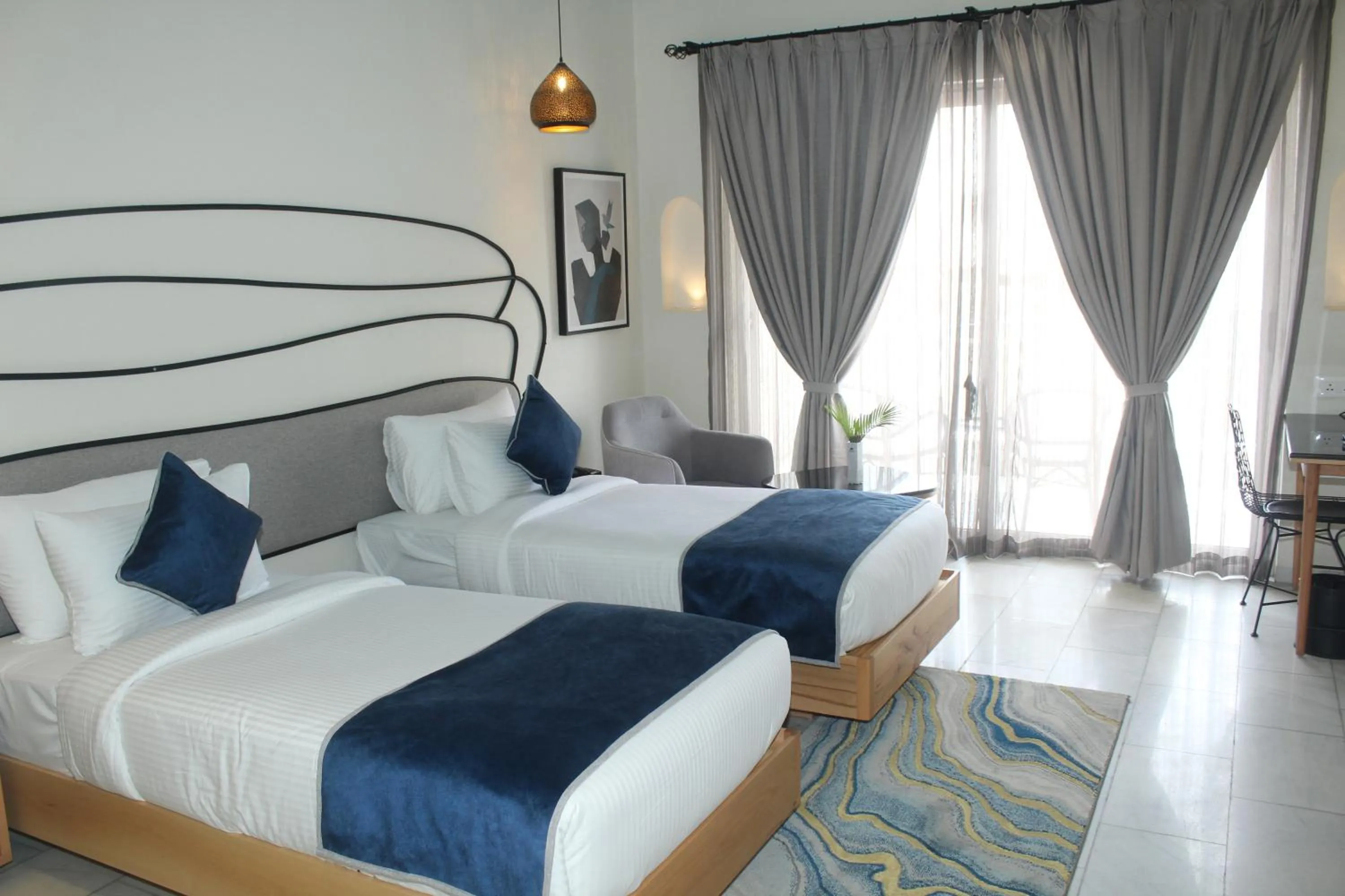 Bed in Ramee Royal Resort & Spa - Udaipur