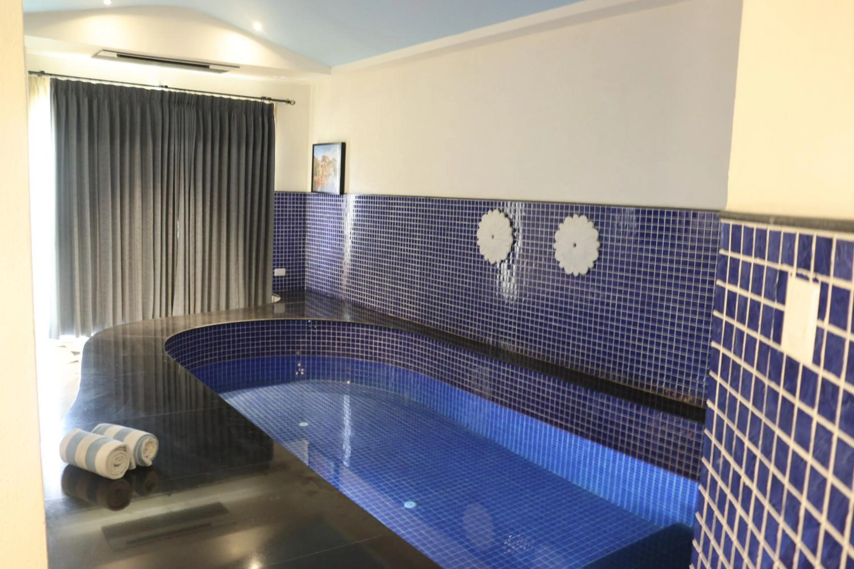 Swimming pool in Ramee Royal Resort & Spa - Udaipur