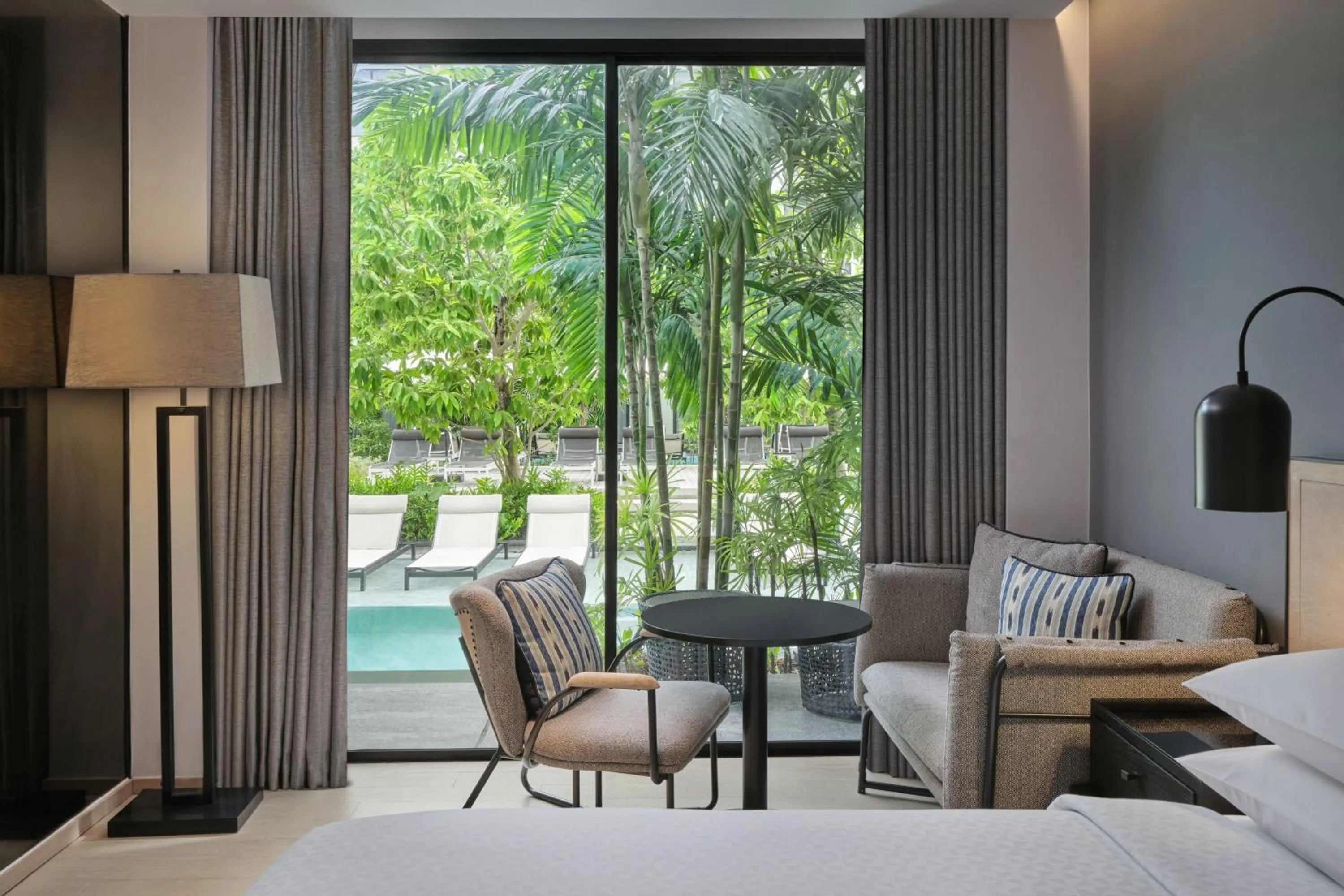 Swimming pool, Bed in Four Points by Sheraton Phuket Patong Beach Resort