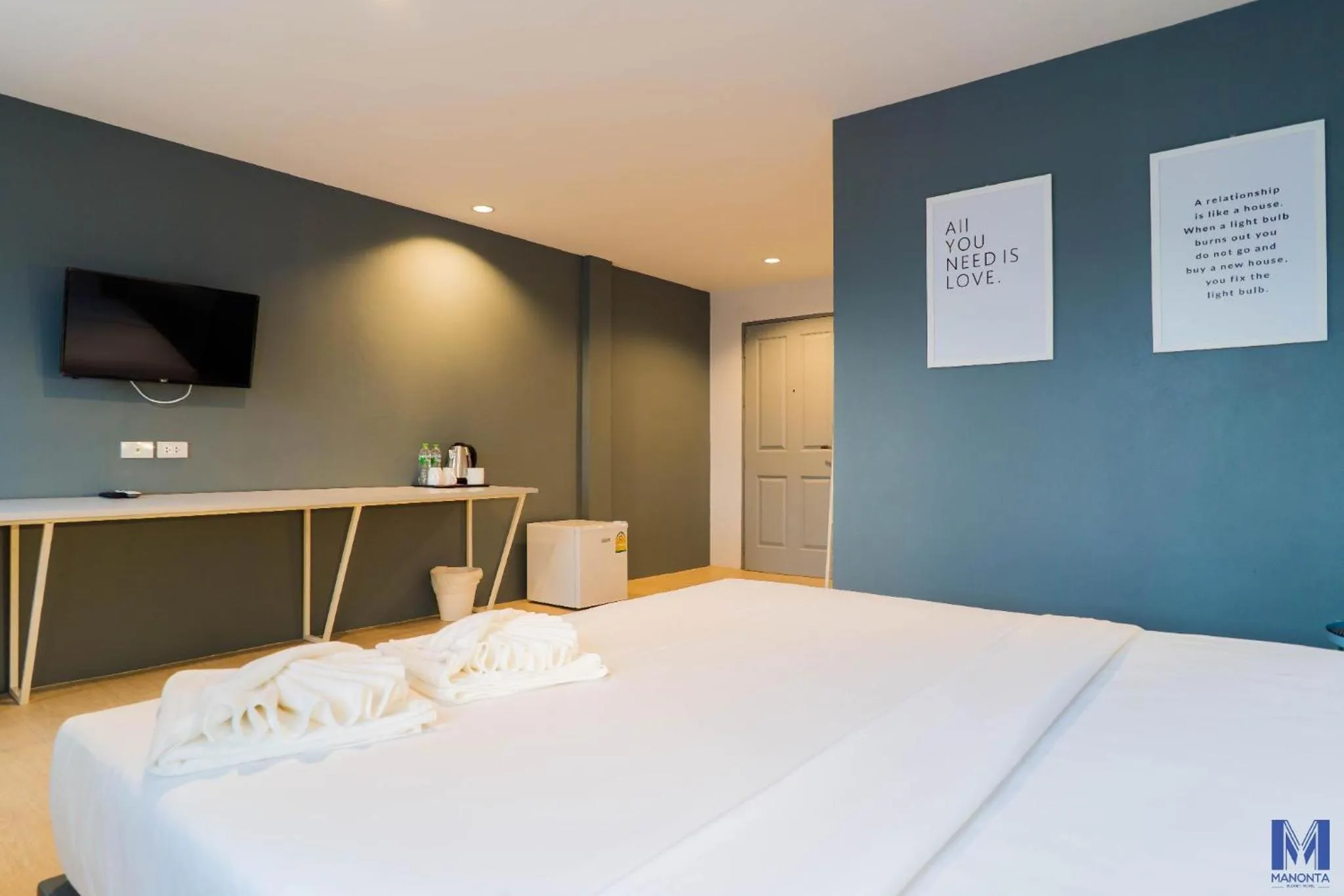 Bed in Manonta Budget Hotel