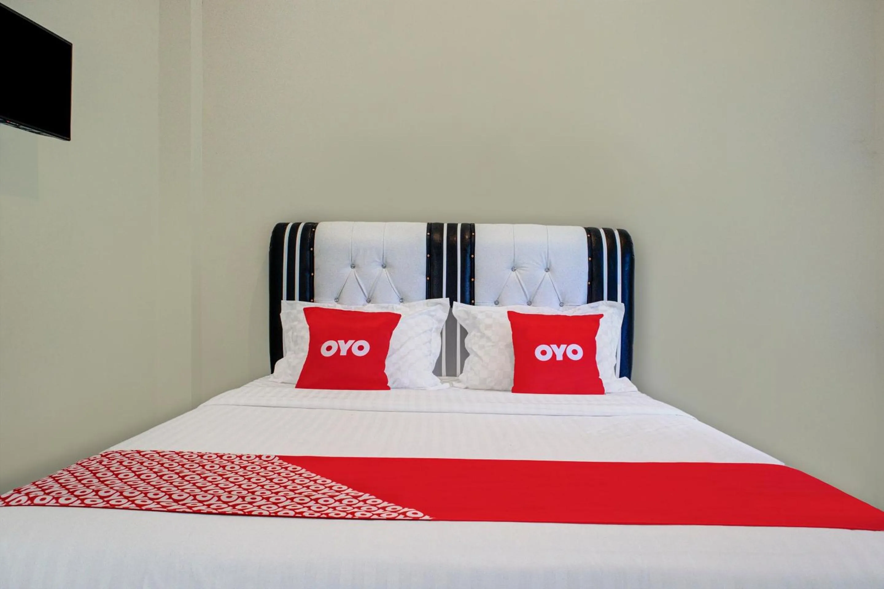 Bedroom in OYO 3266 Alifah Residence Syariah