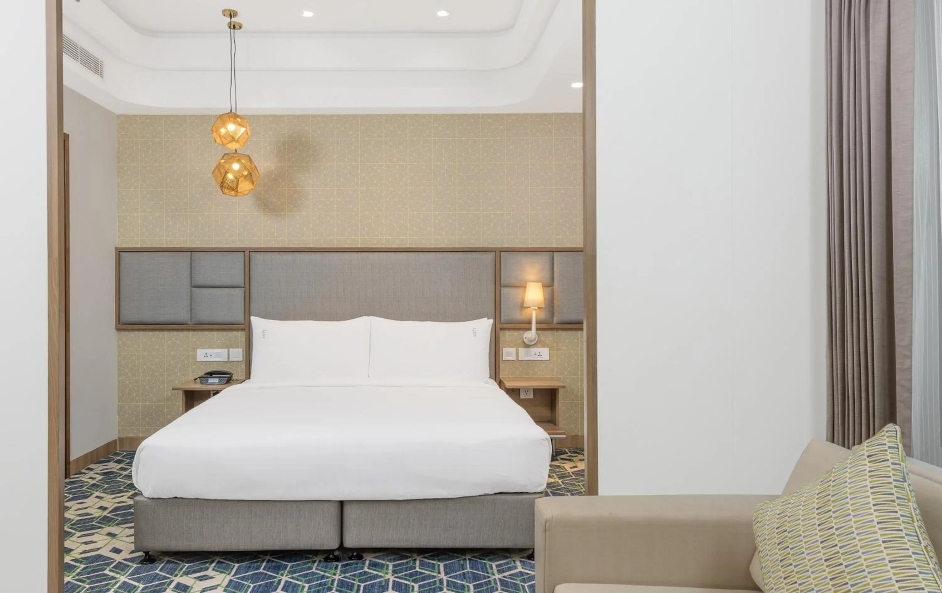 Bed in Holiday Inn Gurugram Sector 90 by IHG