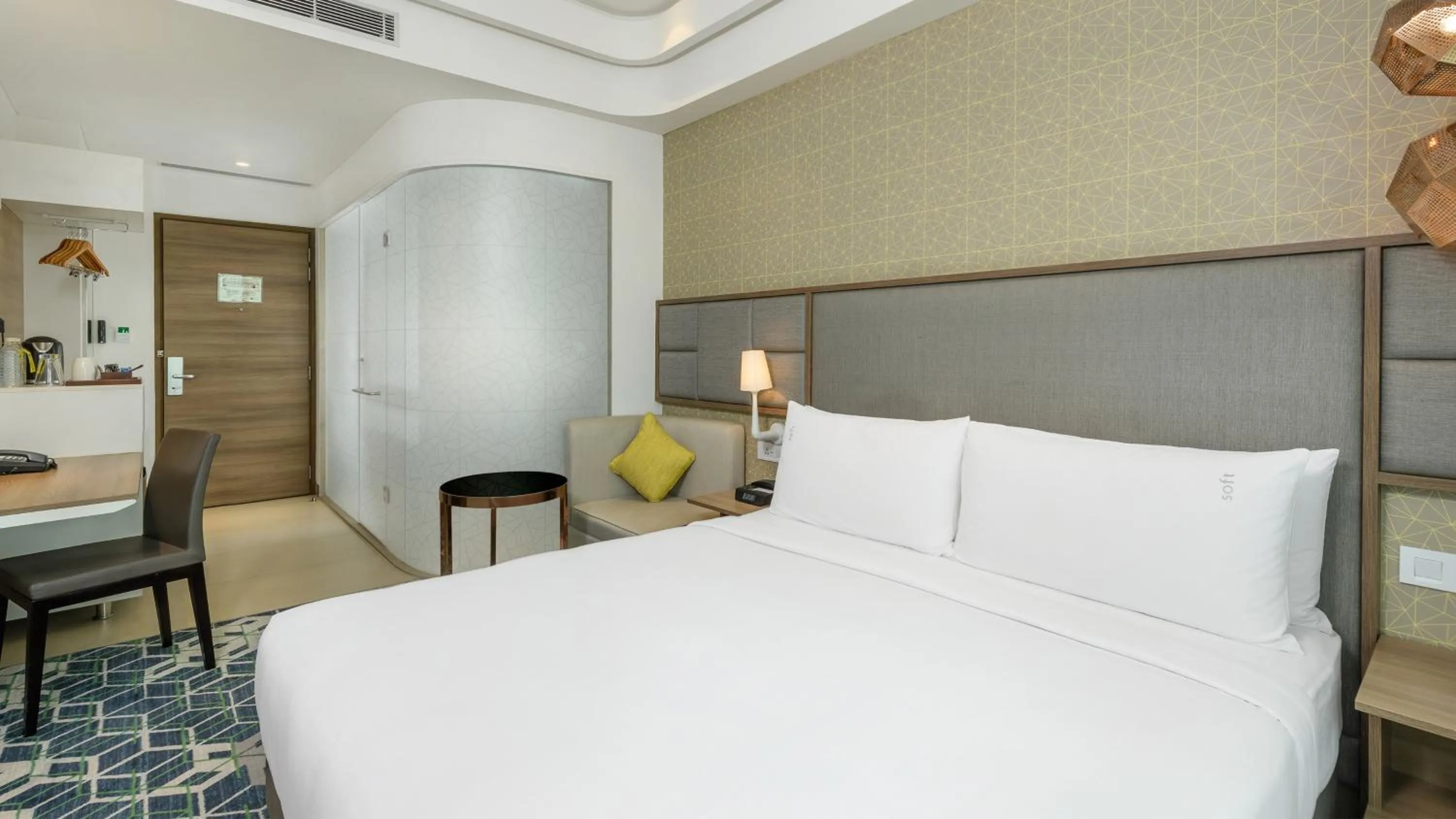 Bed in Holiday Inn Gurugram Sector 90 by IHG