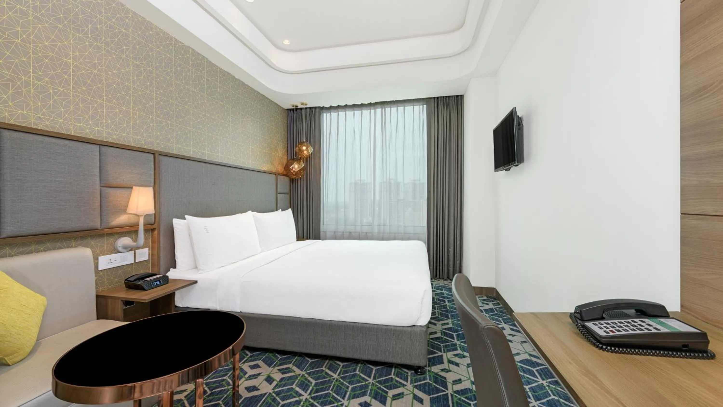 Bed in Holiday Inn Gurugram Sector 90 by IHG
