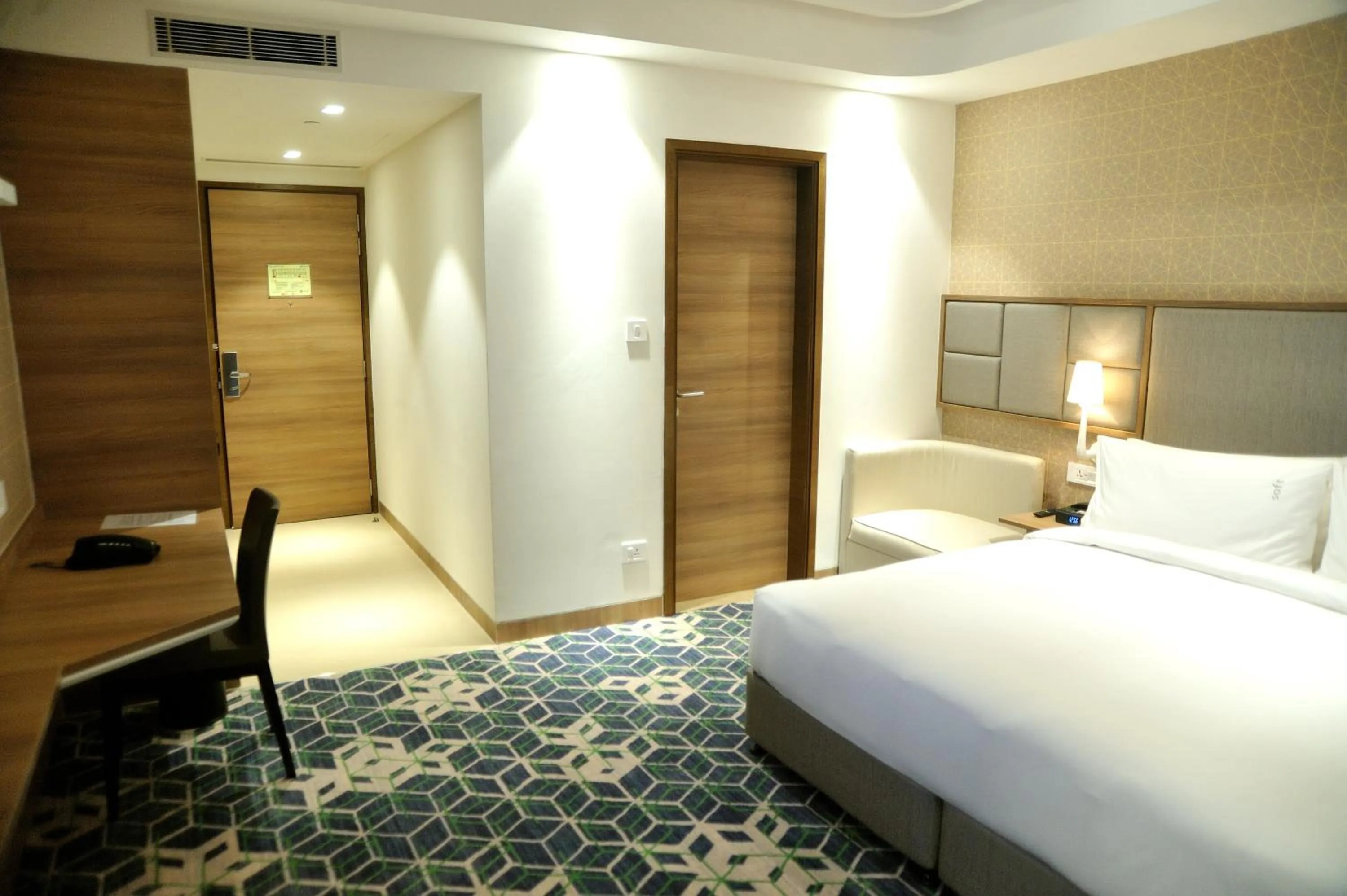 Photo of the whole room, Bed in Holiday Inn Gurugram Sector 90 by IHG