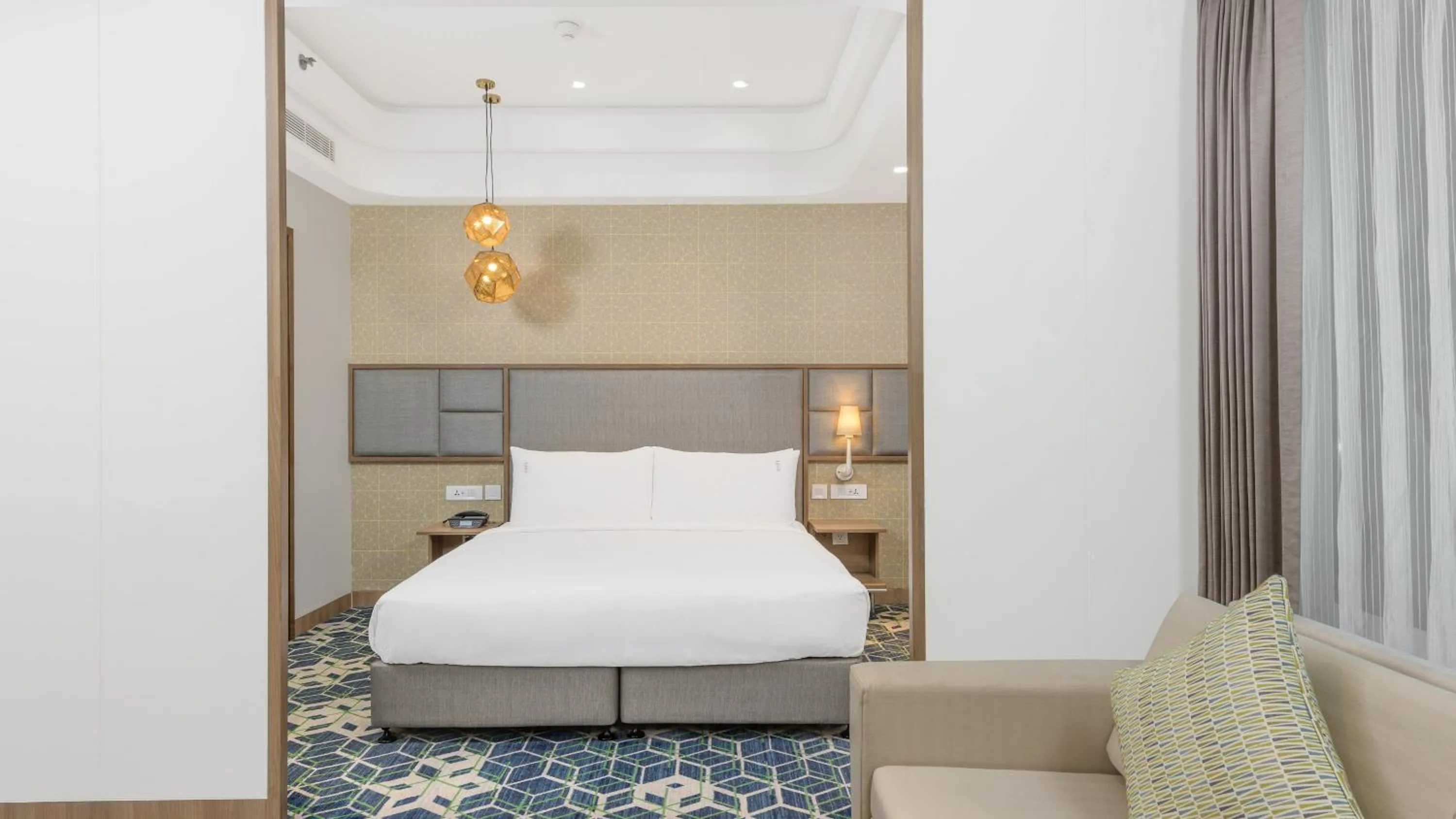 Photo of the whole room, Bed in Holiday Inn Gurugram Sector 90 by IHG