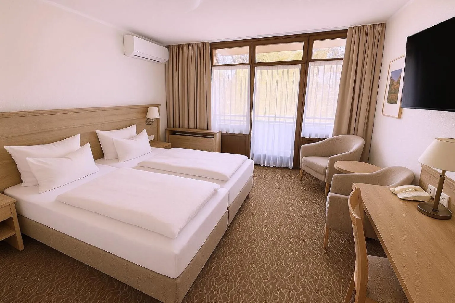 Bed in AMBER HOTEL Bavaria Superior