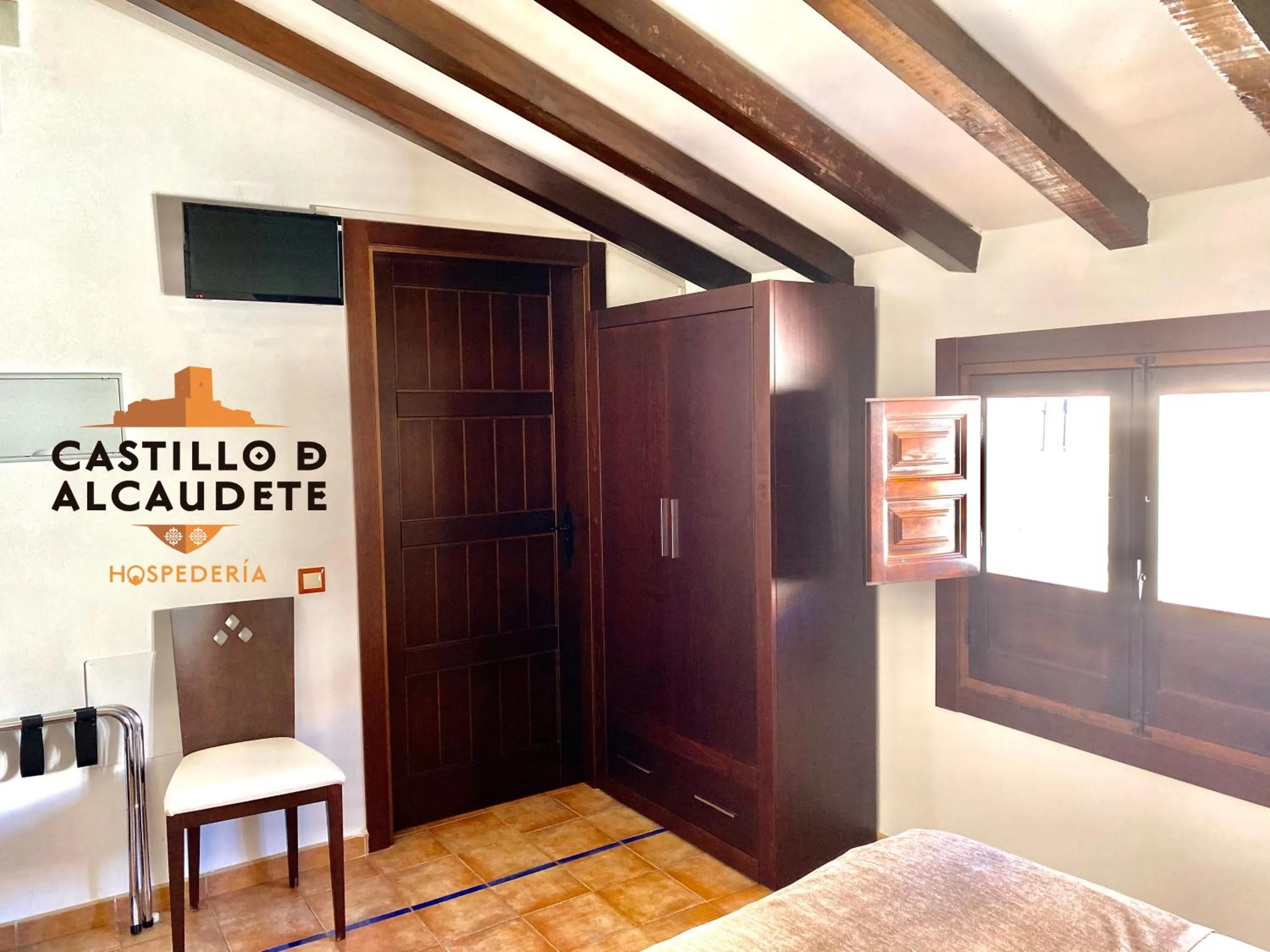 Bed in HOSPEDERÍA CASTILLO DE ALCAUDETE