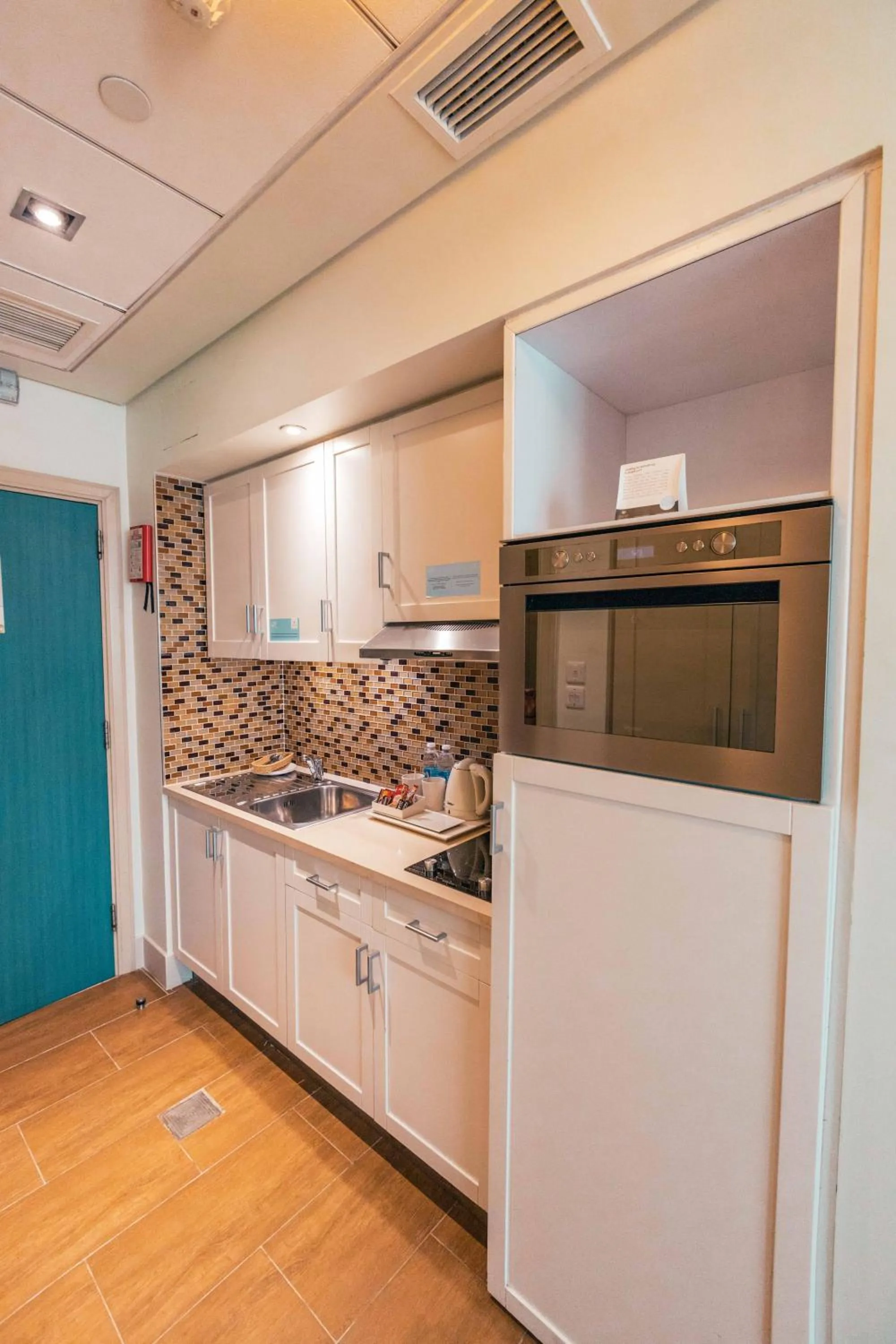 Kitchen or kitchenette in Salalah Gardens Hotel Managed by Safir Hotels & Resorts