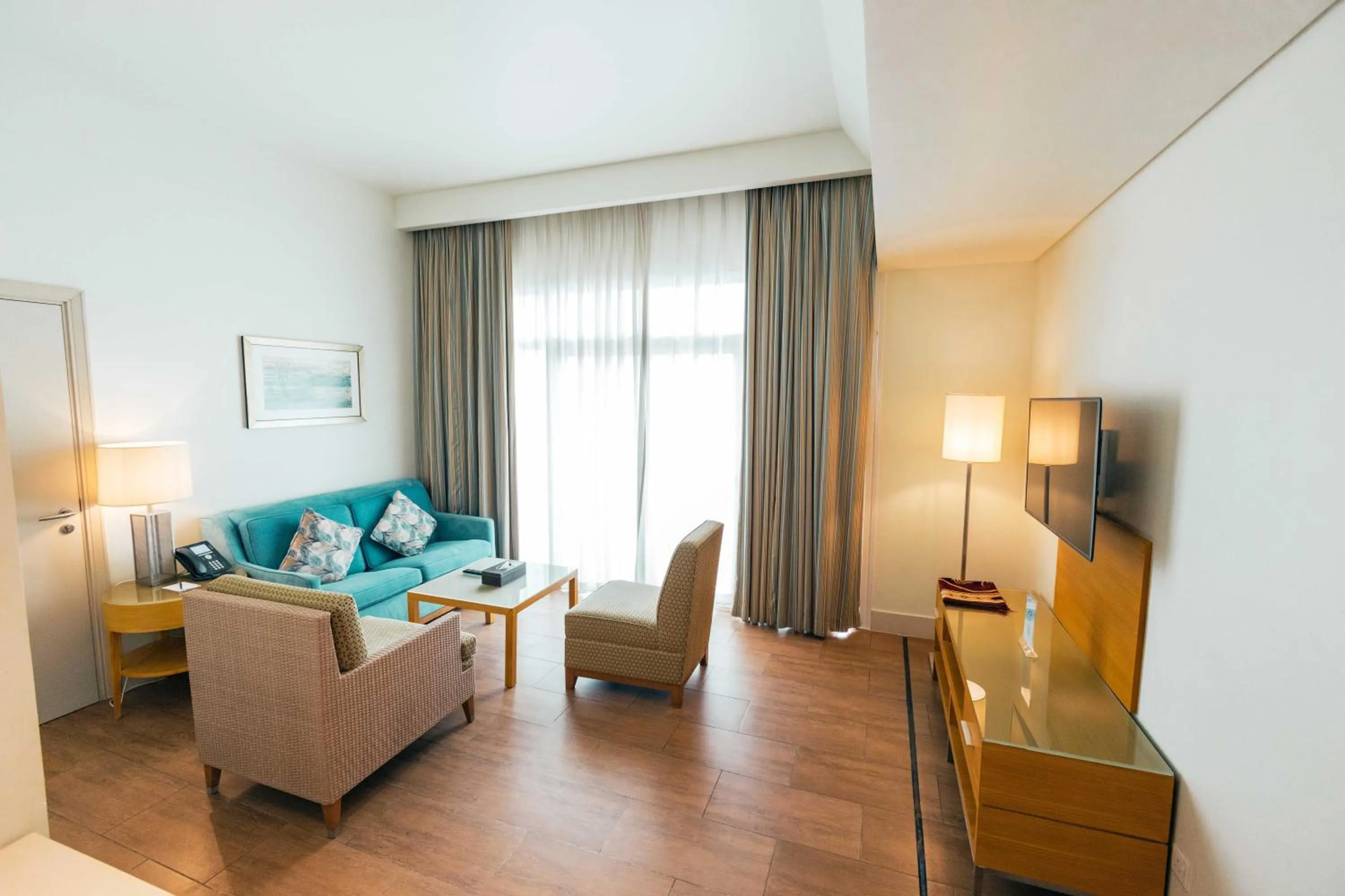 Living room, Bed in Salalah Gardens Hotel Managed by Safir Hotels & Resorts