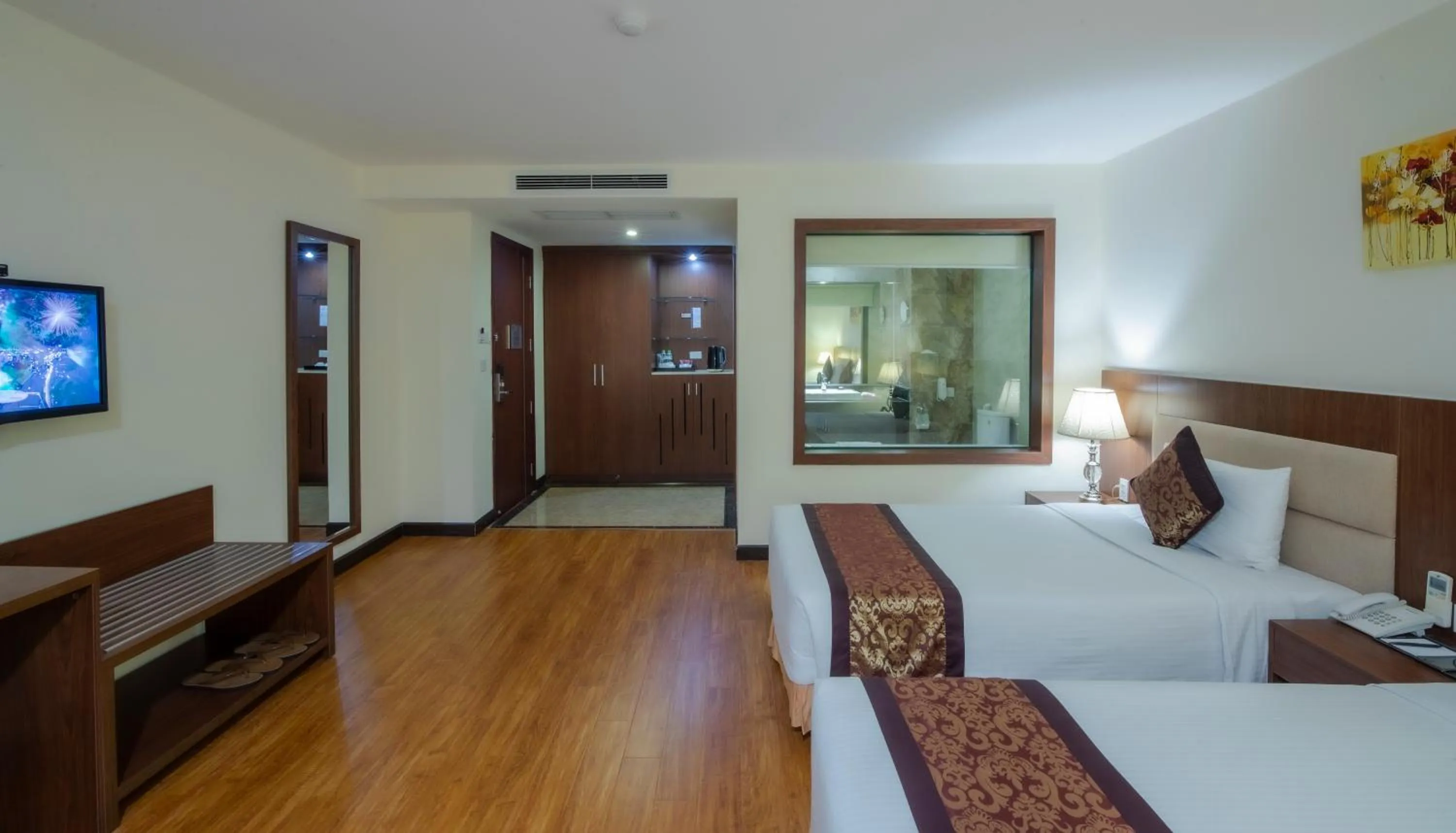 Communal lounge/ TV room, Bed in Muong Thanh Grand Da Nang Hotel