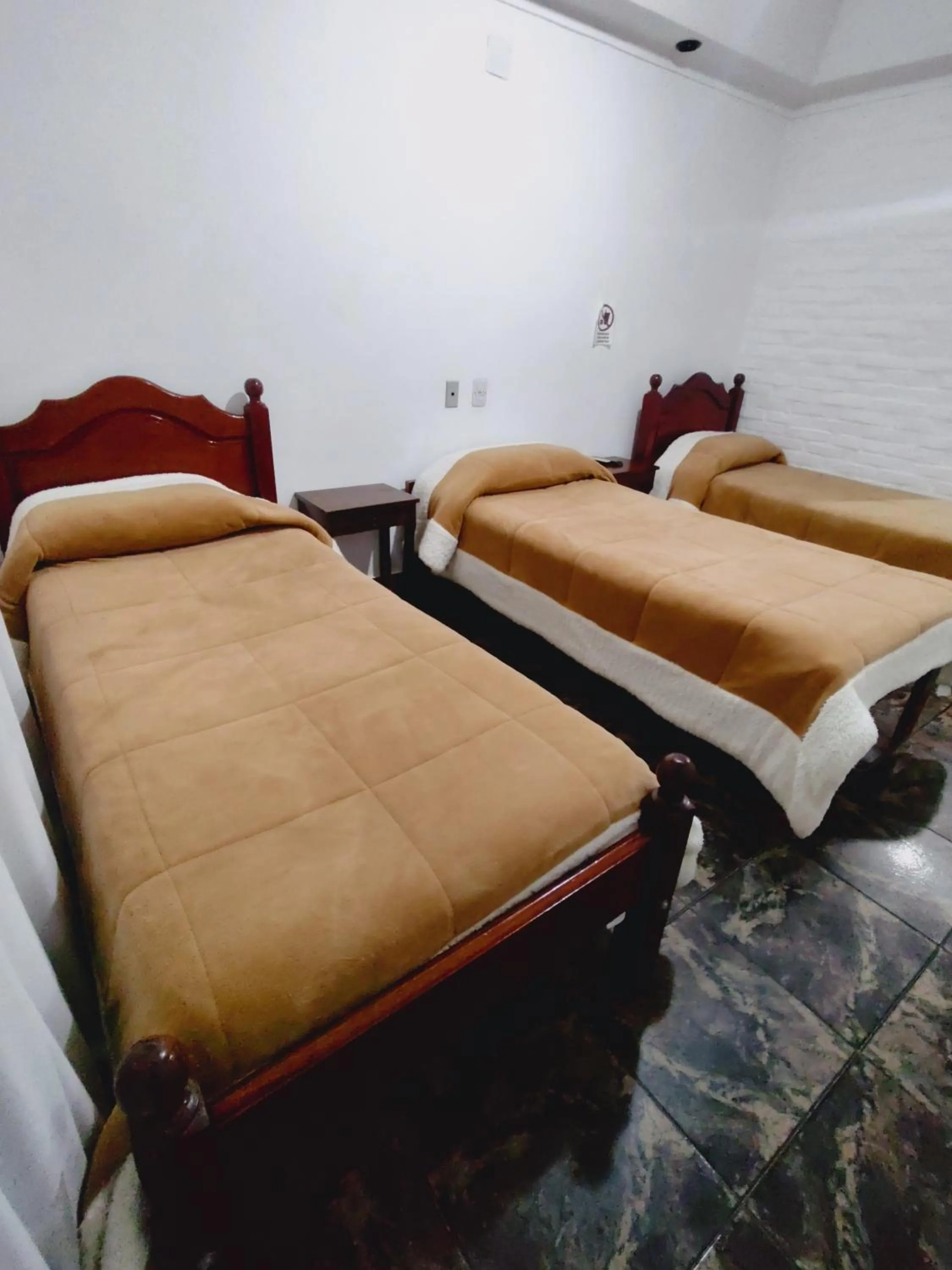 Bed in Hosteria Los Cuartos